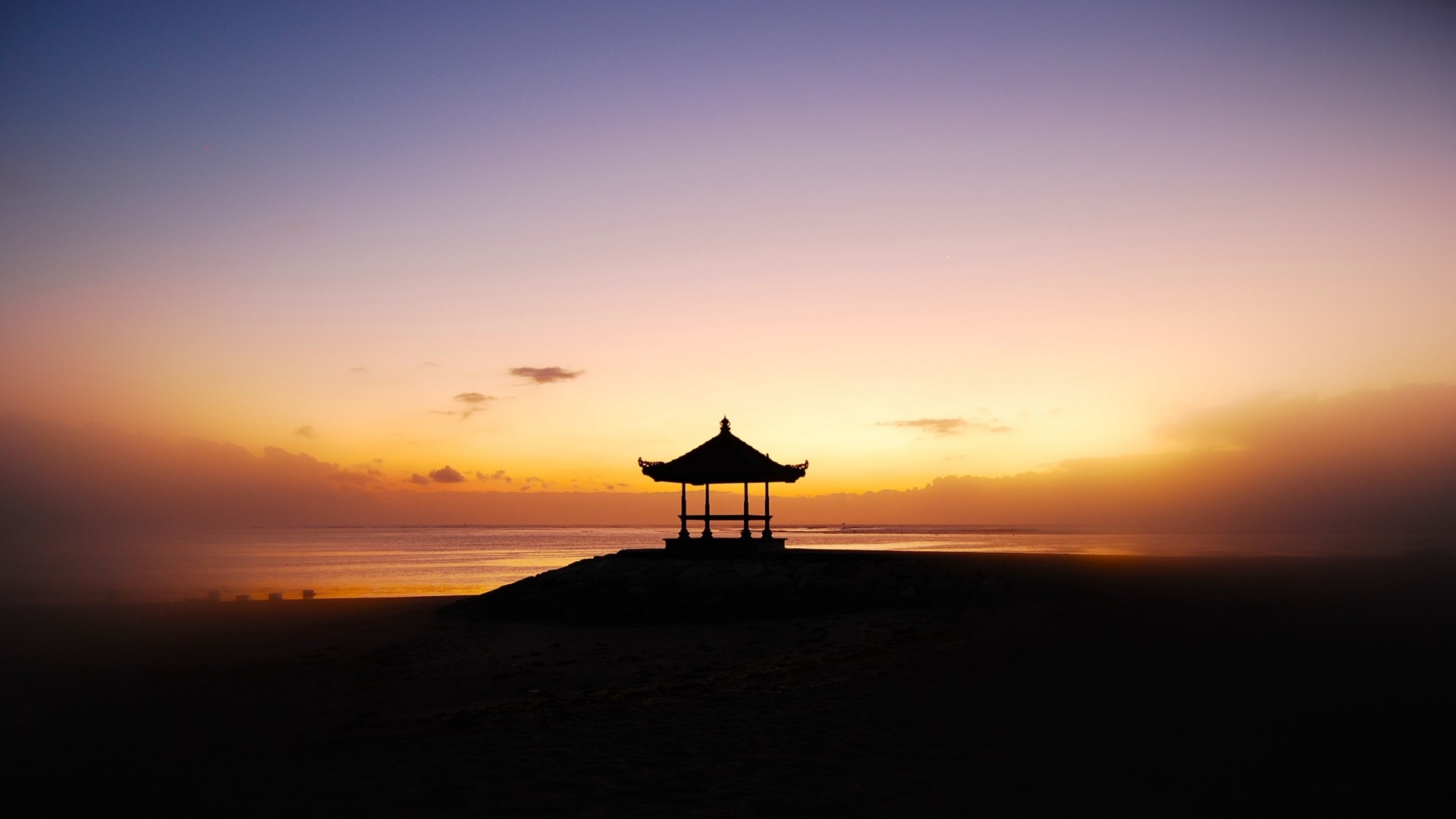 Silhouette of a gazebo on a beach at sunset HD Wallpaper