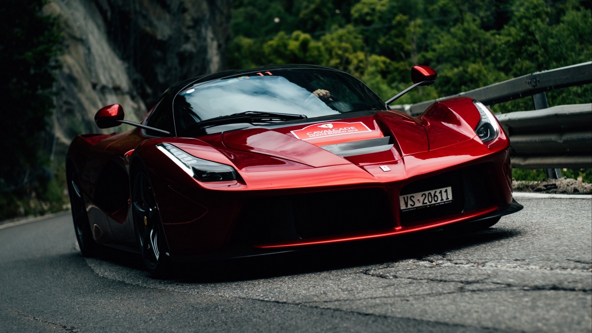 Red Ferrari F70 driving on a mountain road HD Wallpaper