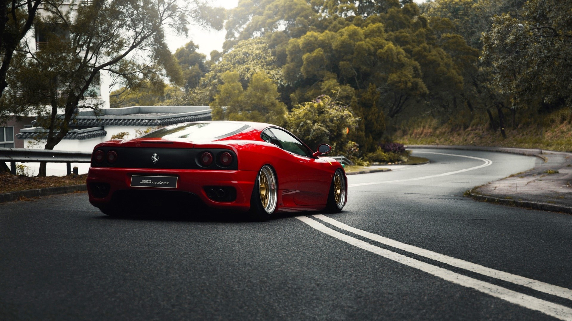 Red Ferrari 360 Modena on a Winding Road HD Wallpaper