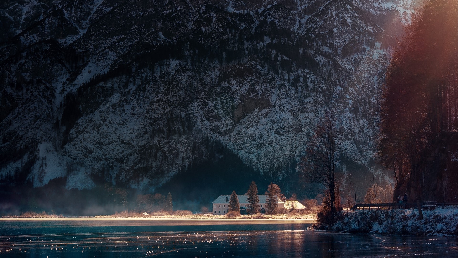 Snowy mountains and lake with a building in Austria HD Wallpaper