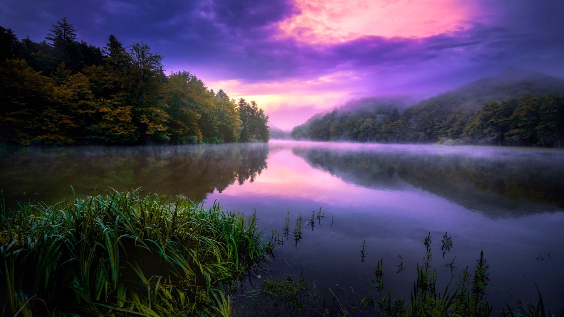 Misty lake at sunrise with purple sky HD Wallpaper