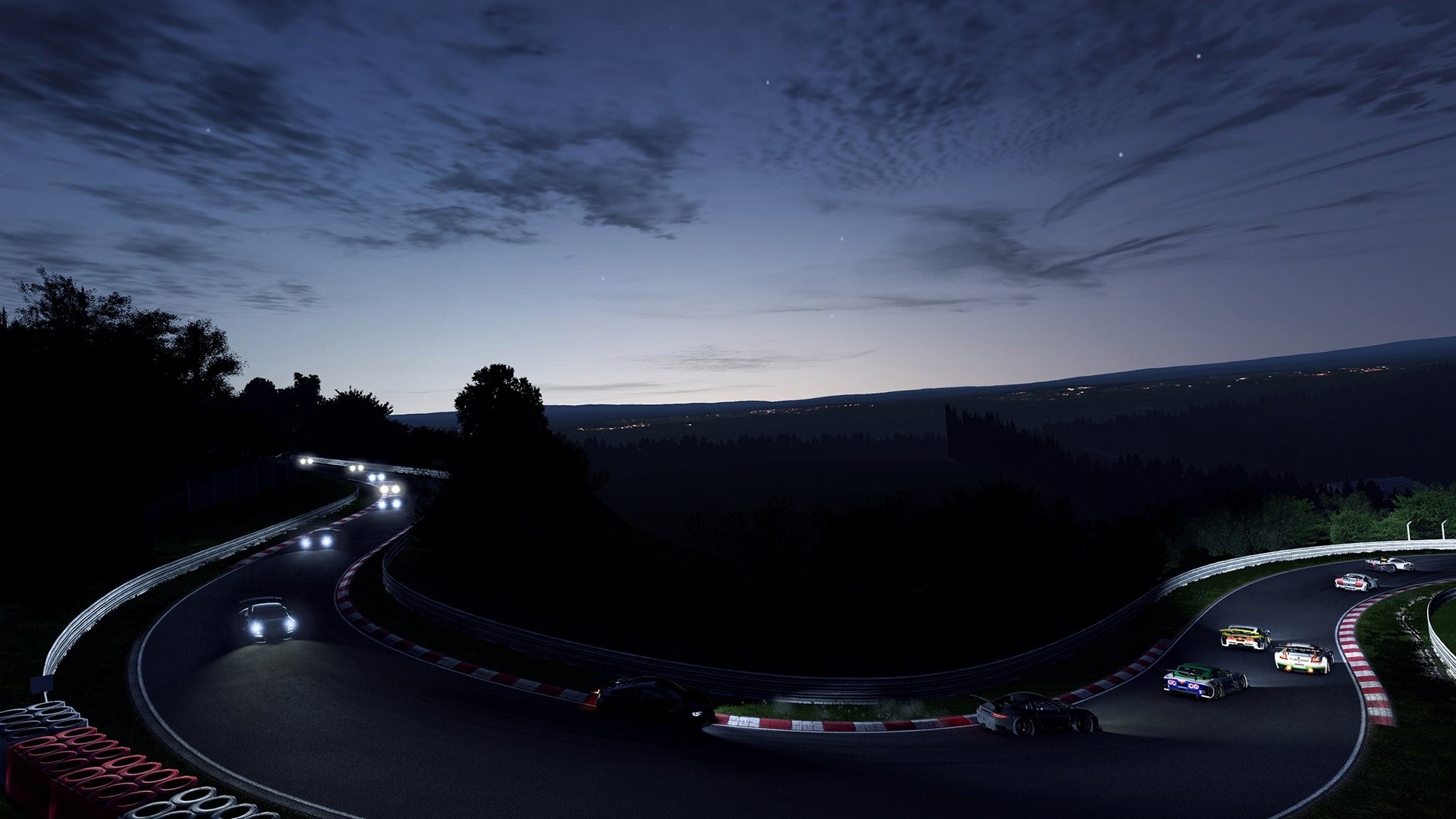 Cars racing on a track at night HD Wallpaper