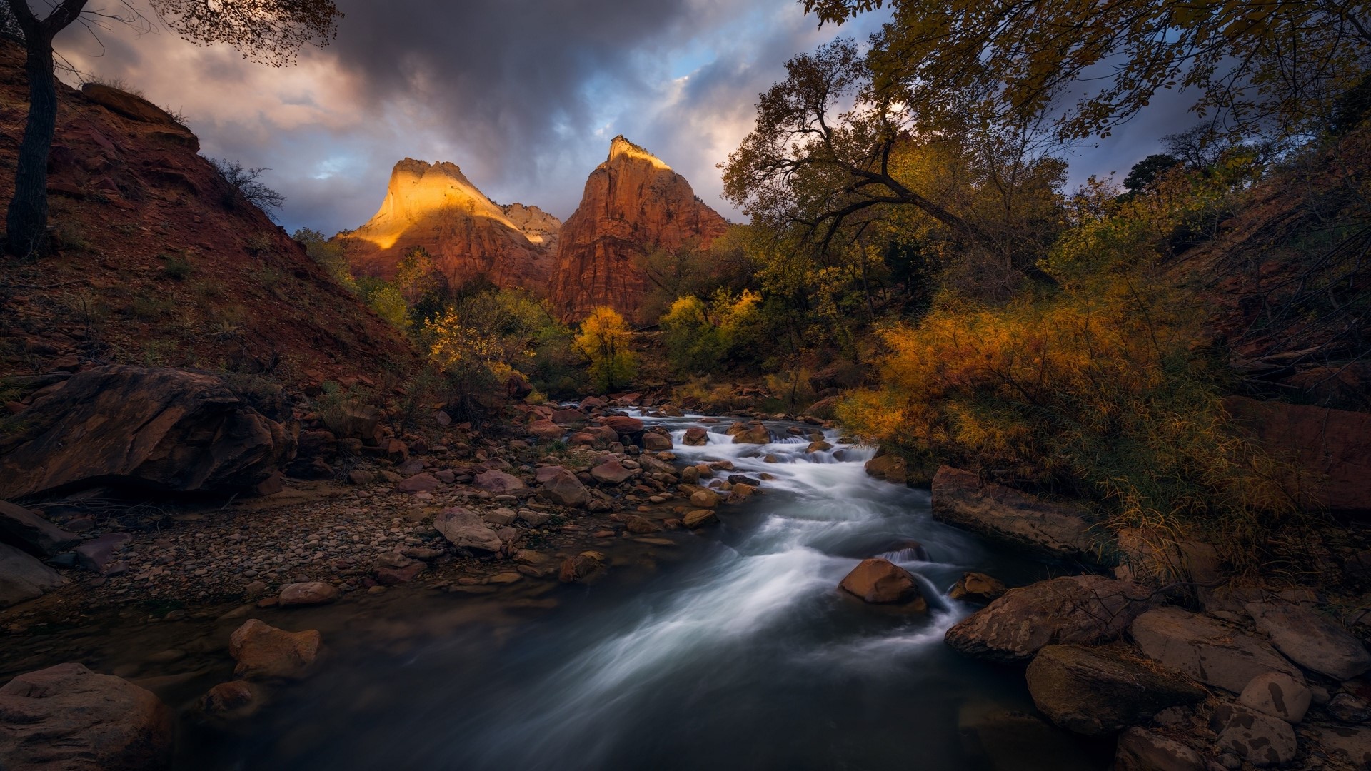 Mountain river flowing through a rocky canyon during autumn HD Wallpaper
