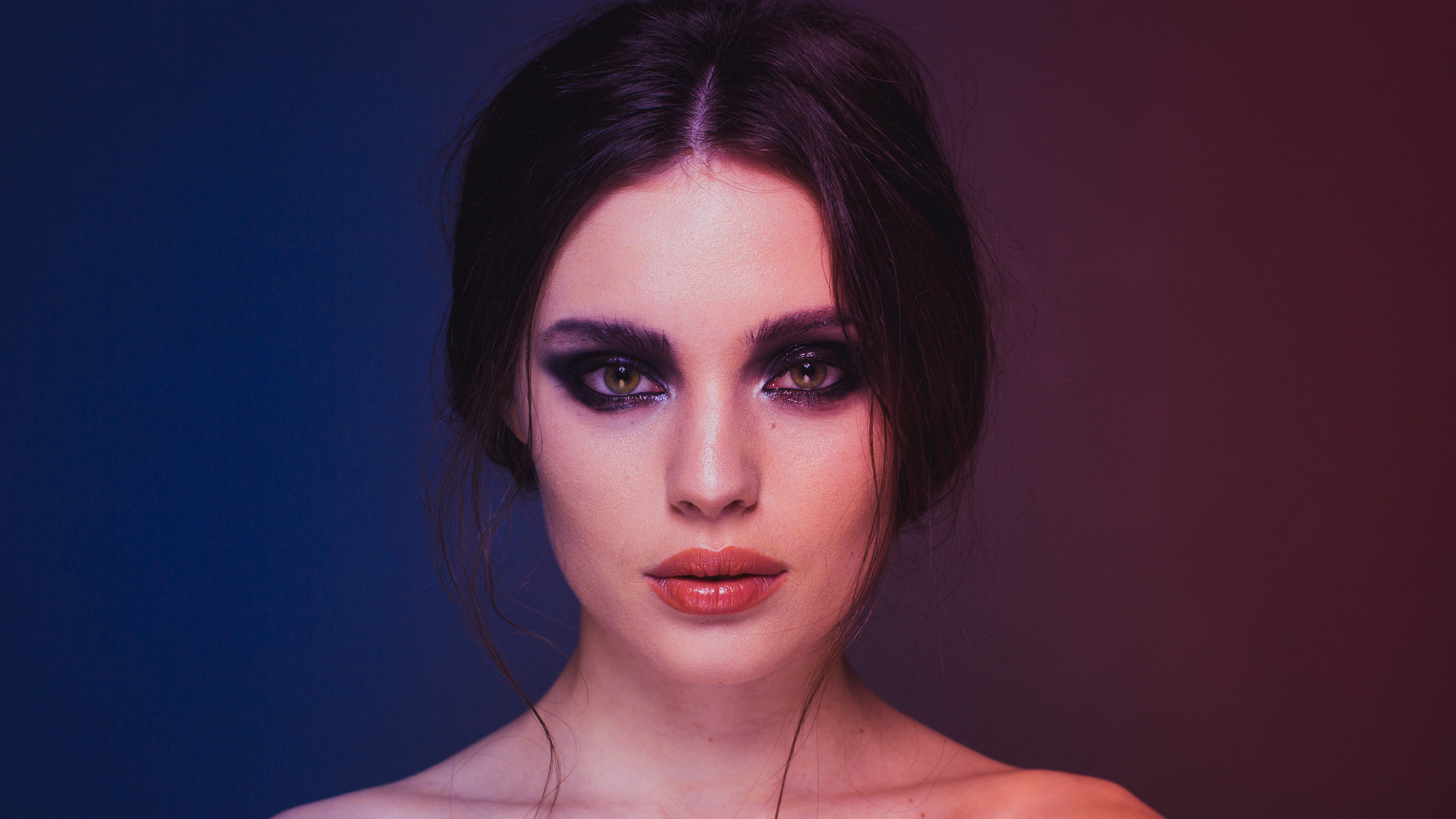 Woman with dramatic eye makeup HD Wallpaper