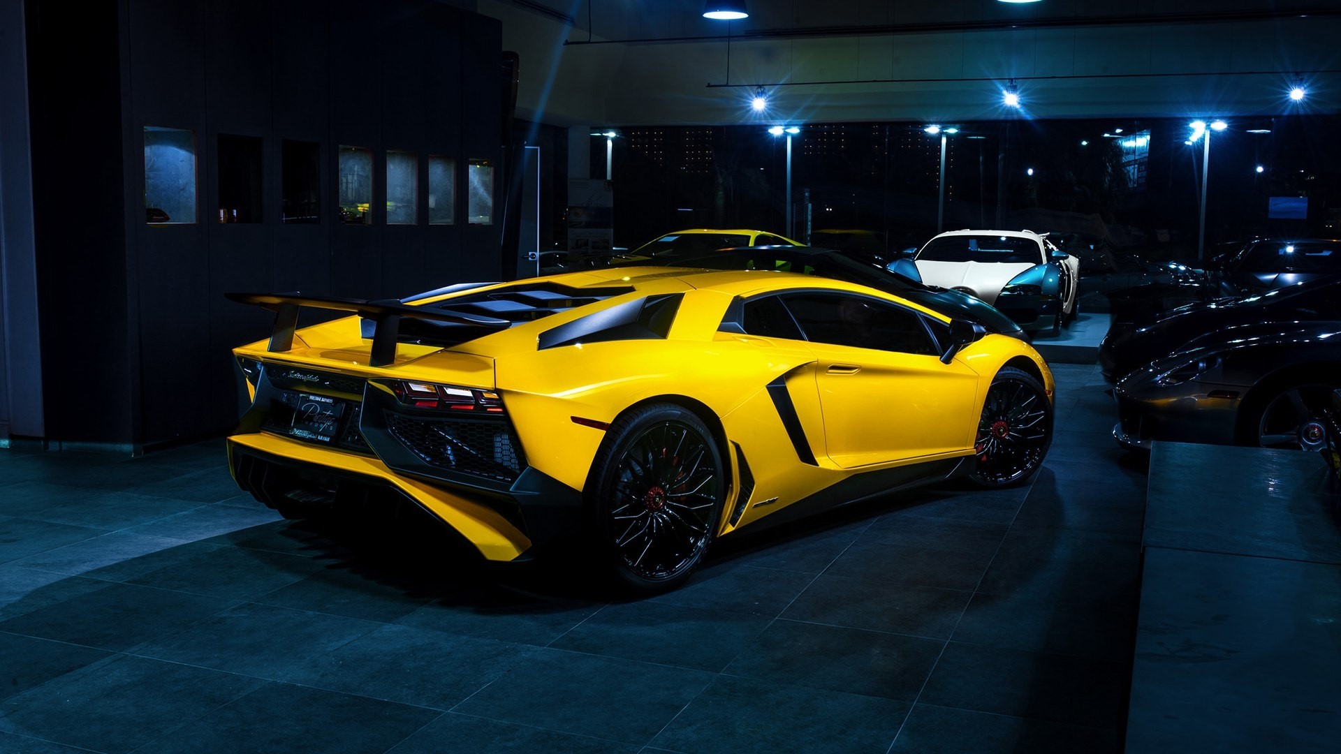 Yellow Lamborghini Aventador SV in showroom HD Wallpaper
