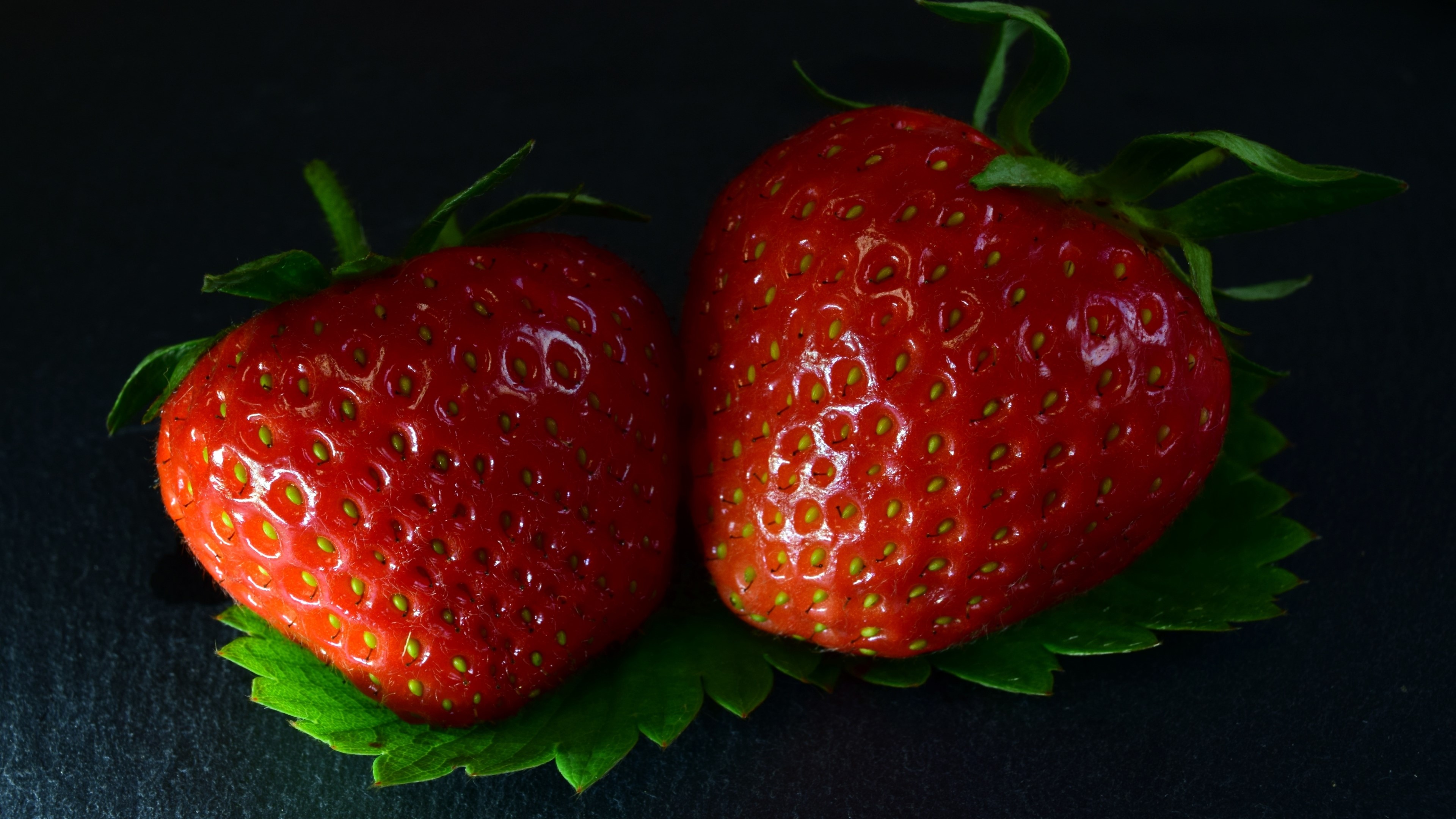 Two Strawberries on a Leaf HD Wallpaper