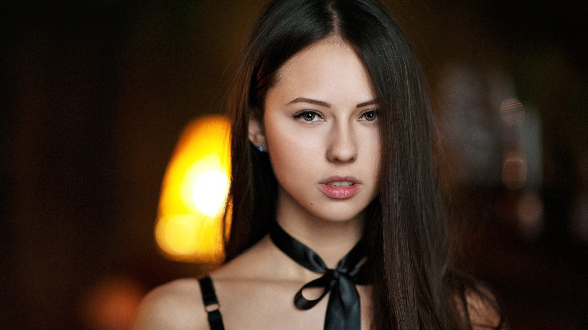 Young woman with dark hair and black ribbon HD Wallpaper