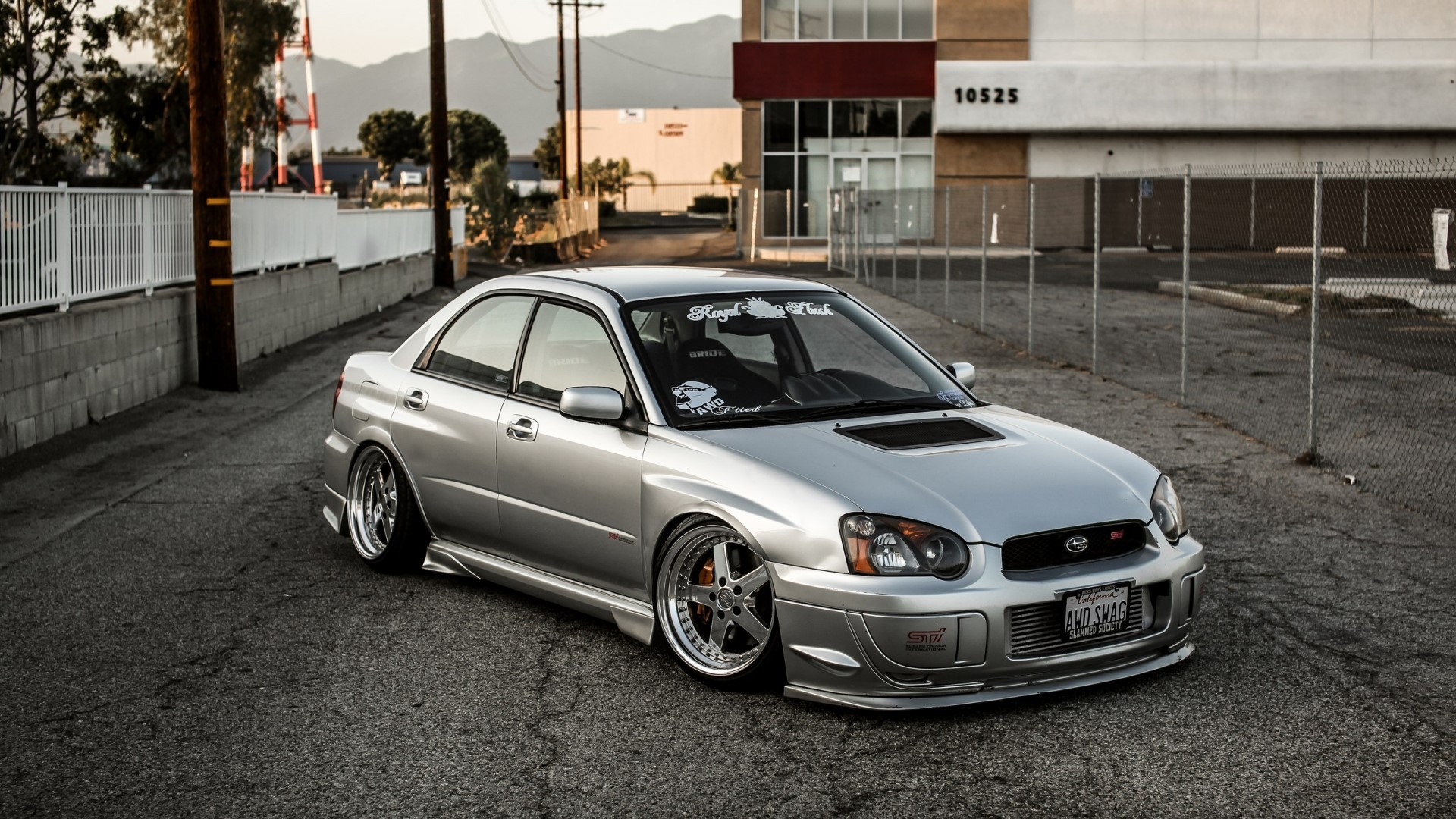 Silver Subaru Impreza STI parked on asphalt HD Wallpaper