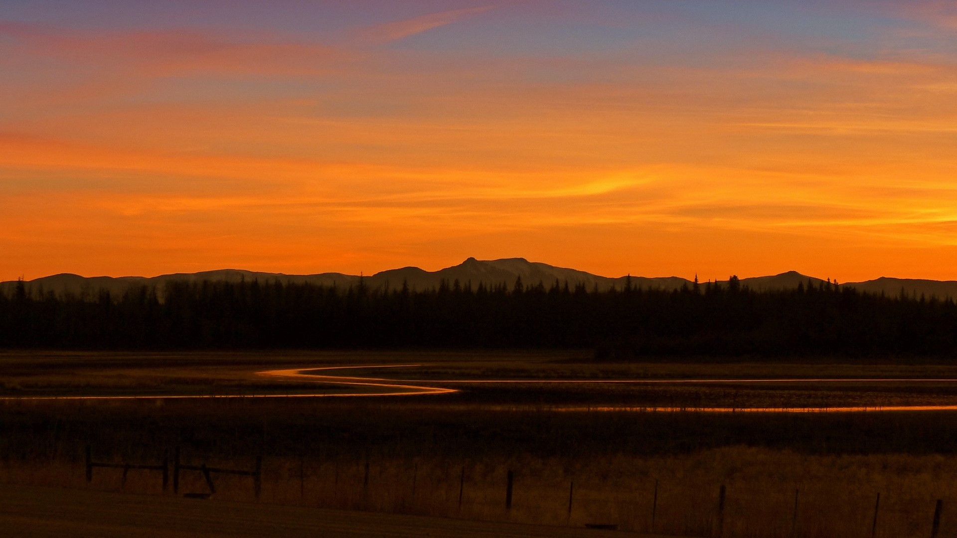 Sunset over mountains and river HD Wallpaper