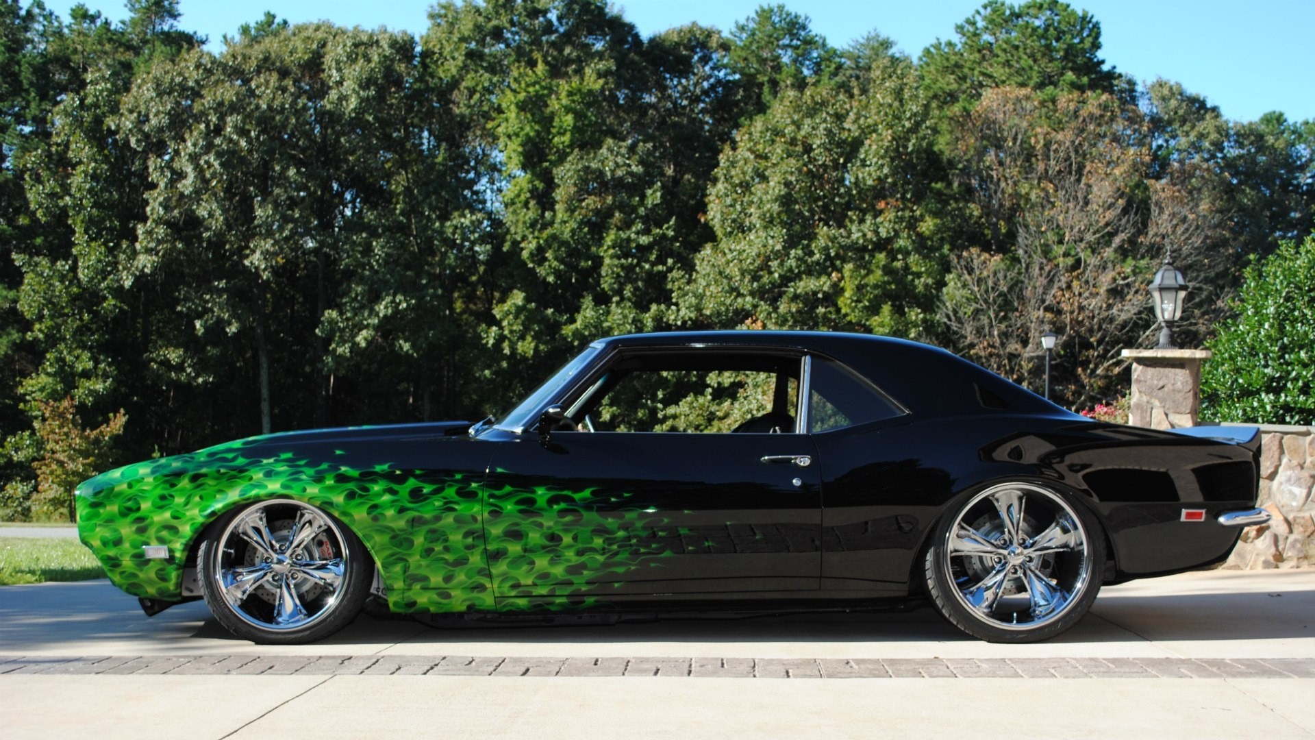 Black 1968 Chevrolet Camaro with green flame graphics HD Wallpaper