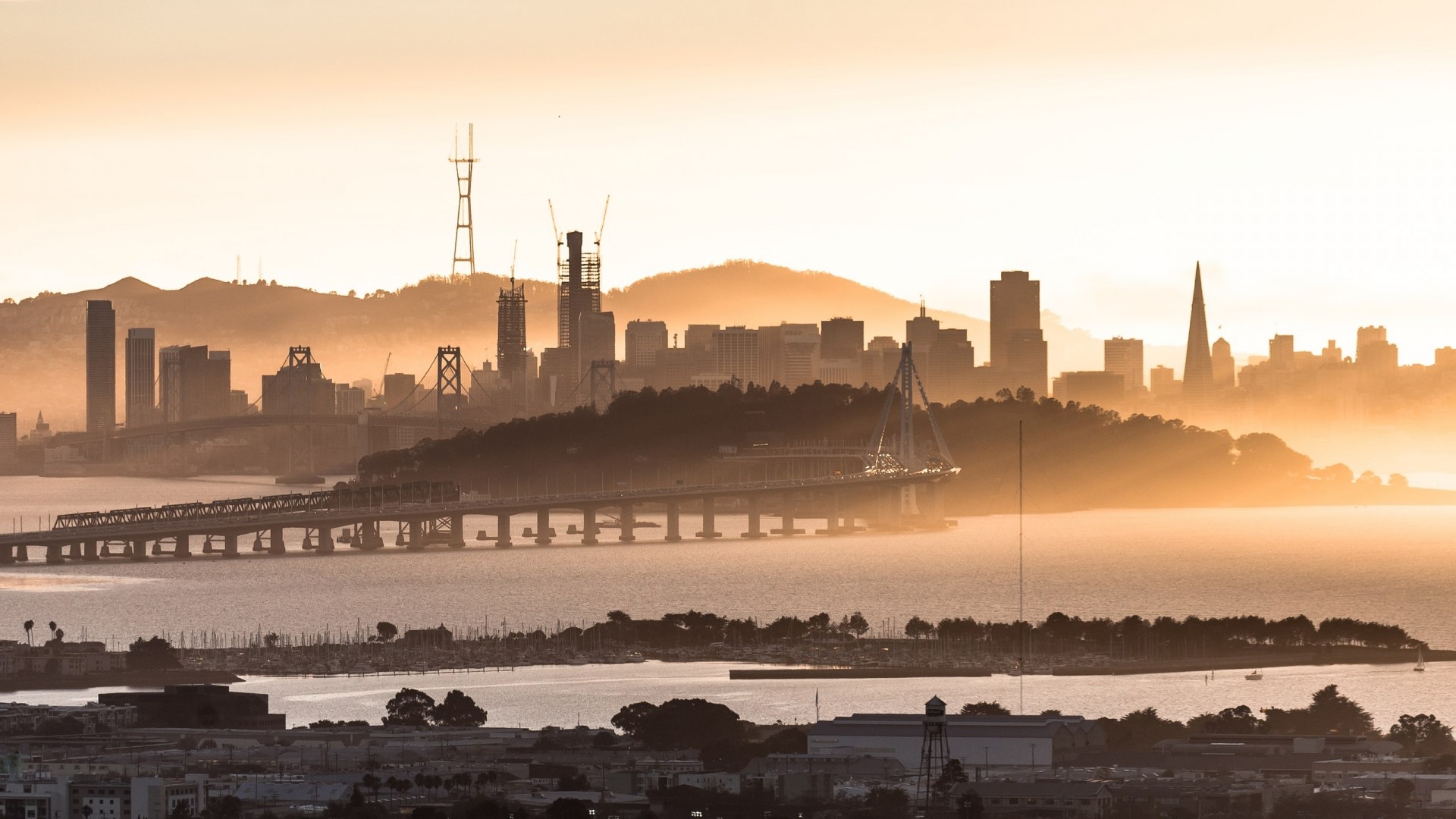 San Francisco skyline with bridges and fog HD Wallpaper