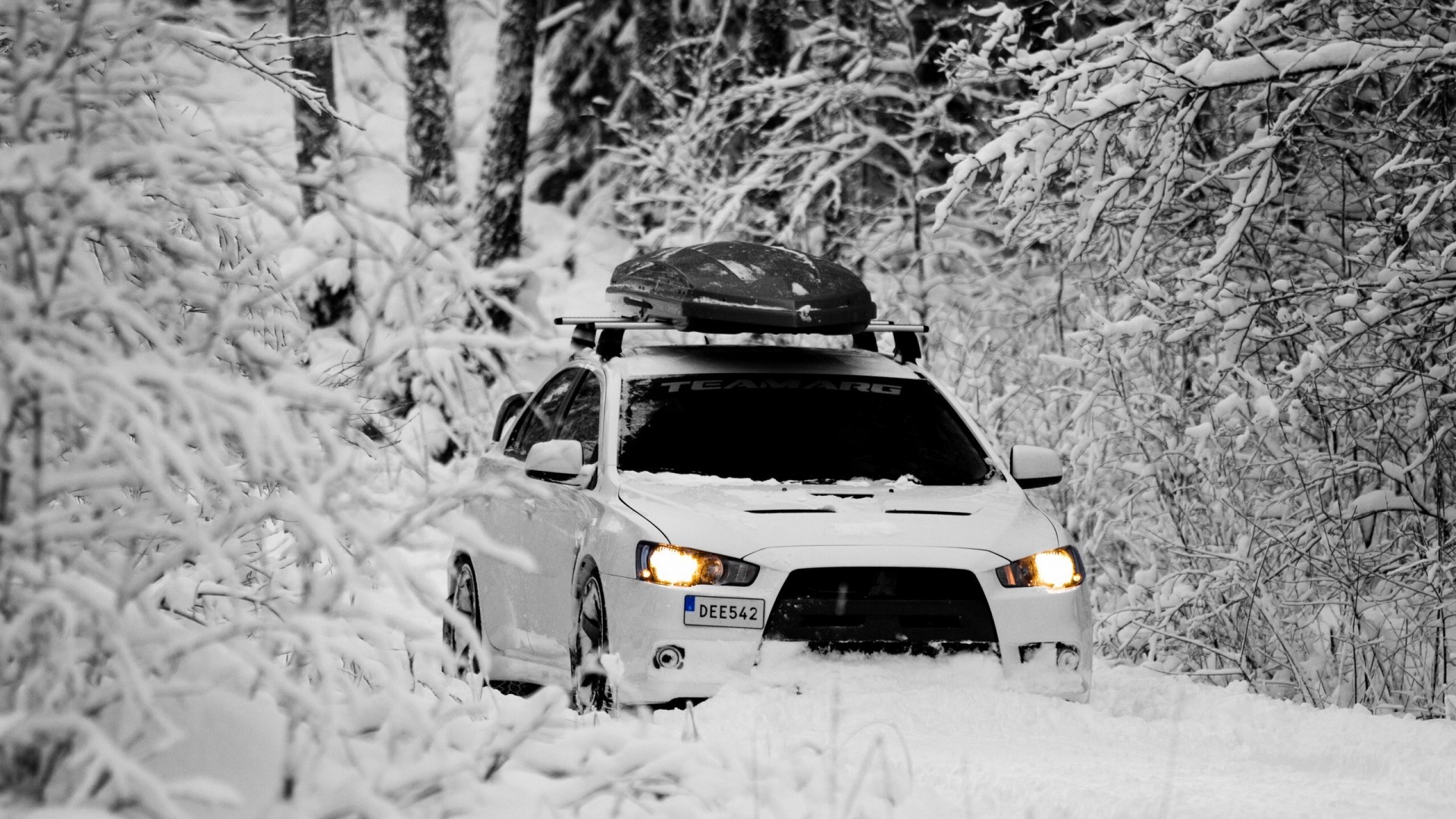 White Mitsubishi Lancer Evolution X in Snow HD Wallpaper