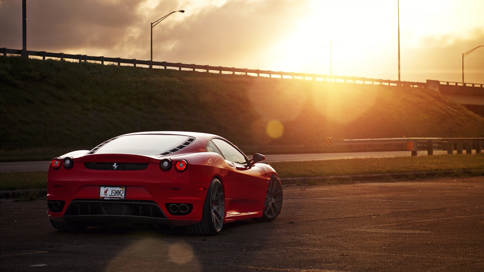 Red Ferrari F430 parked at sunset HD Wallpaper