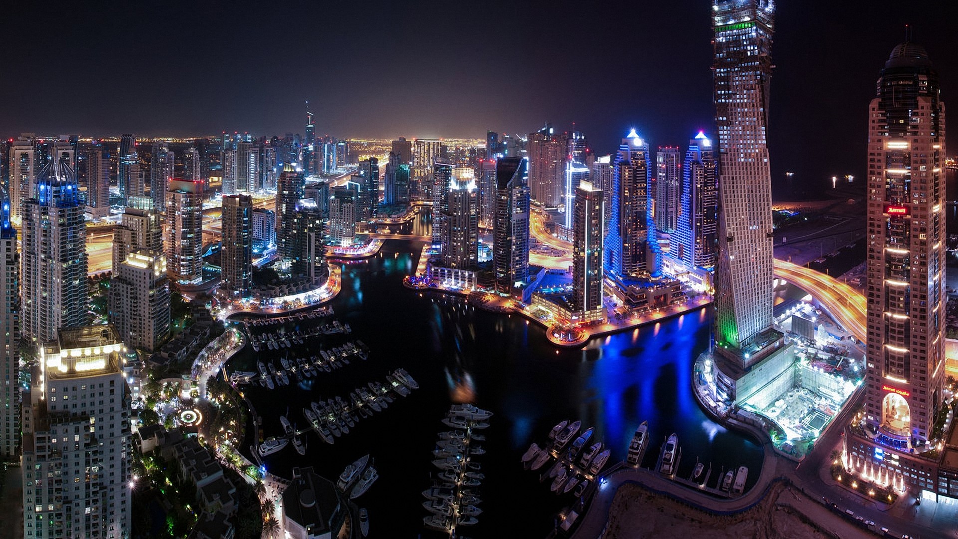Dubai Marina skyscrapers at night with boats HD Wallpaper