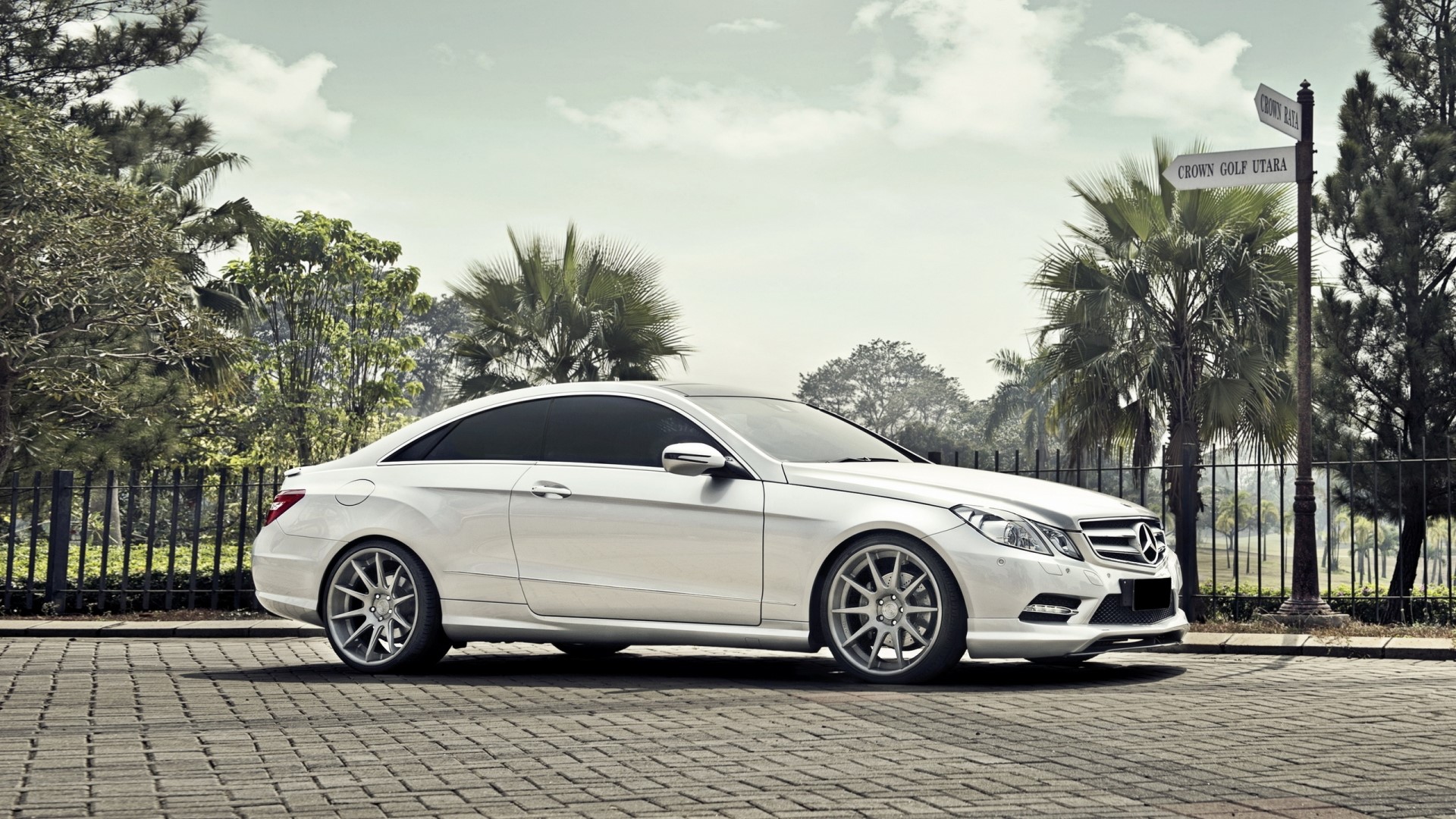 White Mercedes-Benz E-Class Coupe on Paved Road HD Wallpaper
