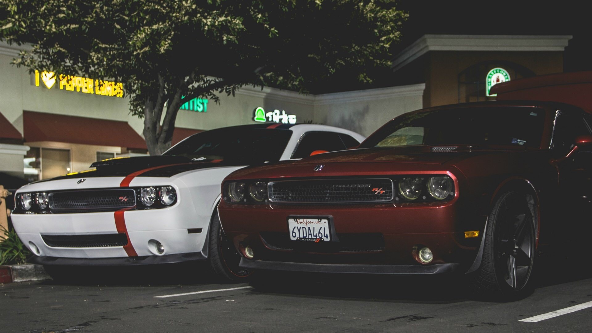 Two Dodge Challengers parked at night HD Wallpaper
