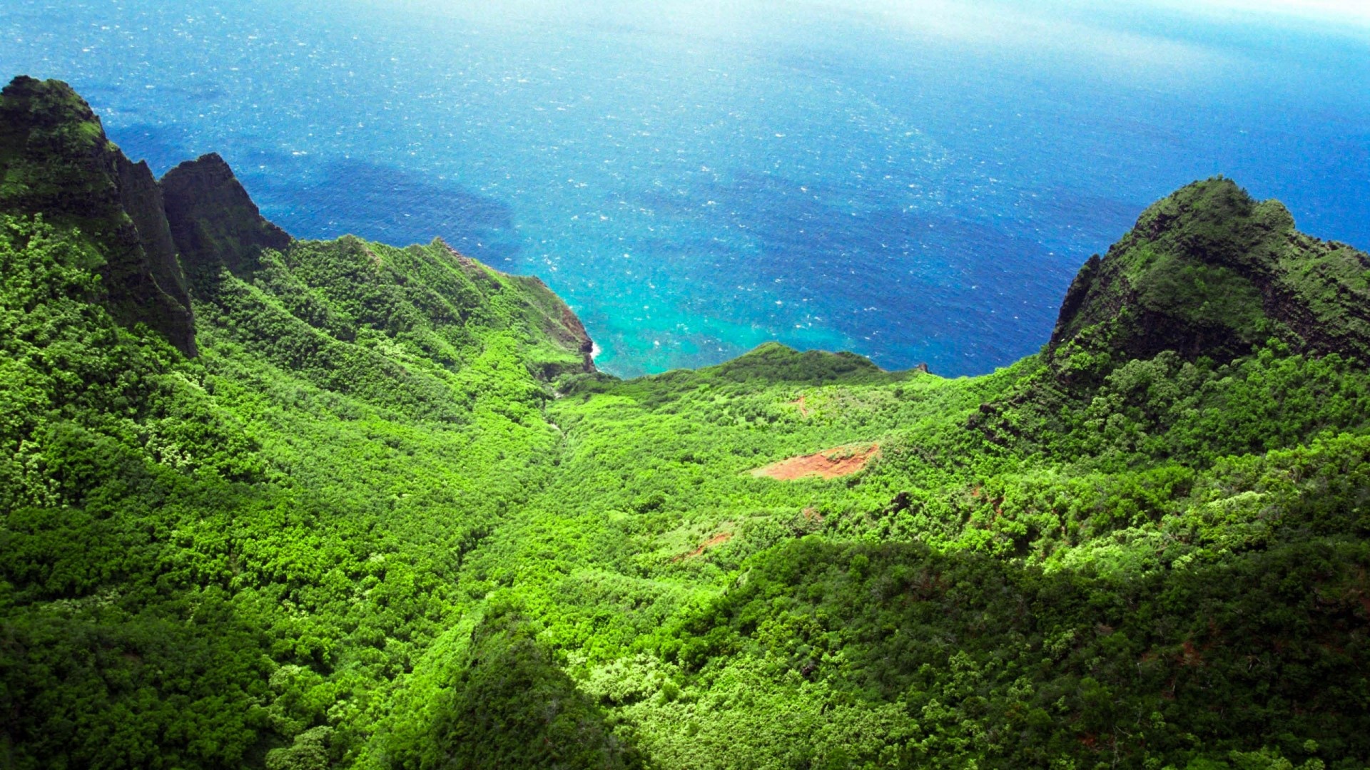 Green Cliffs Overlooking Blue Ocean HD Wallpaper