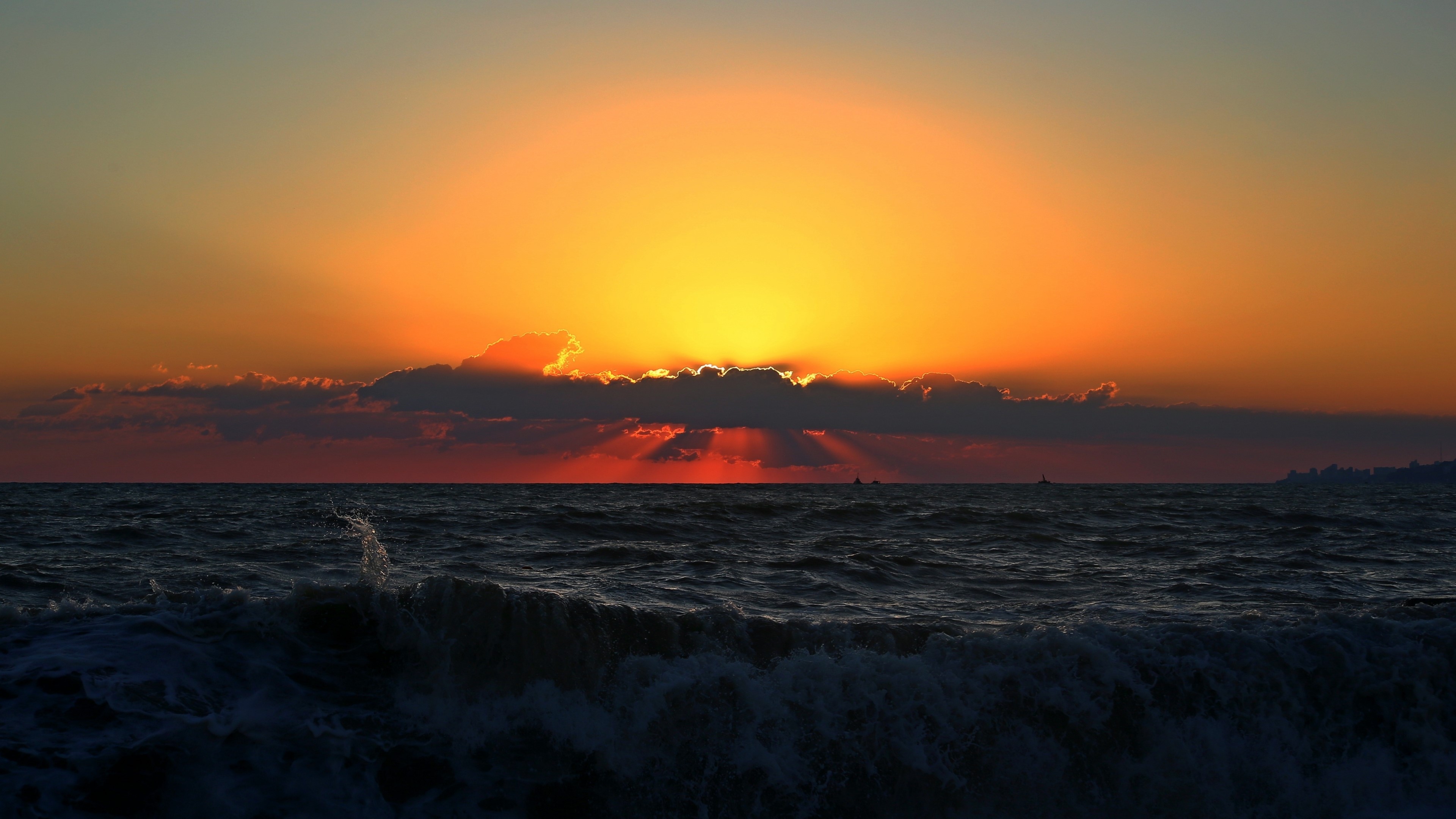 Sunset over the sea with waves HD Wallpaper