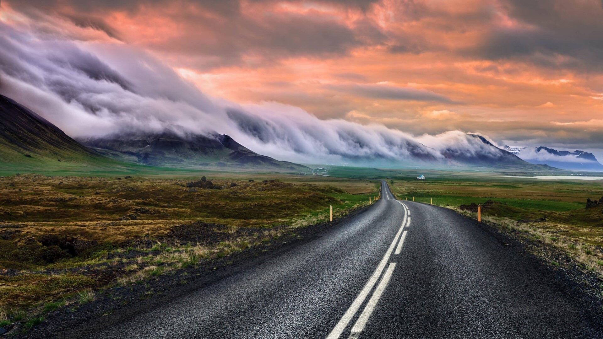 Road through Iceland with dramatic clouds HD Wallpaper