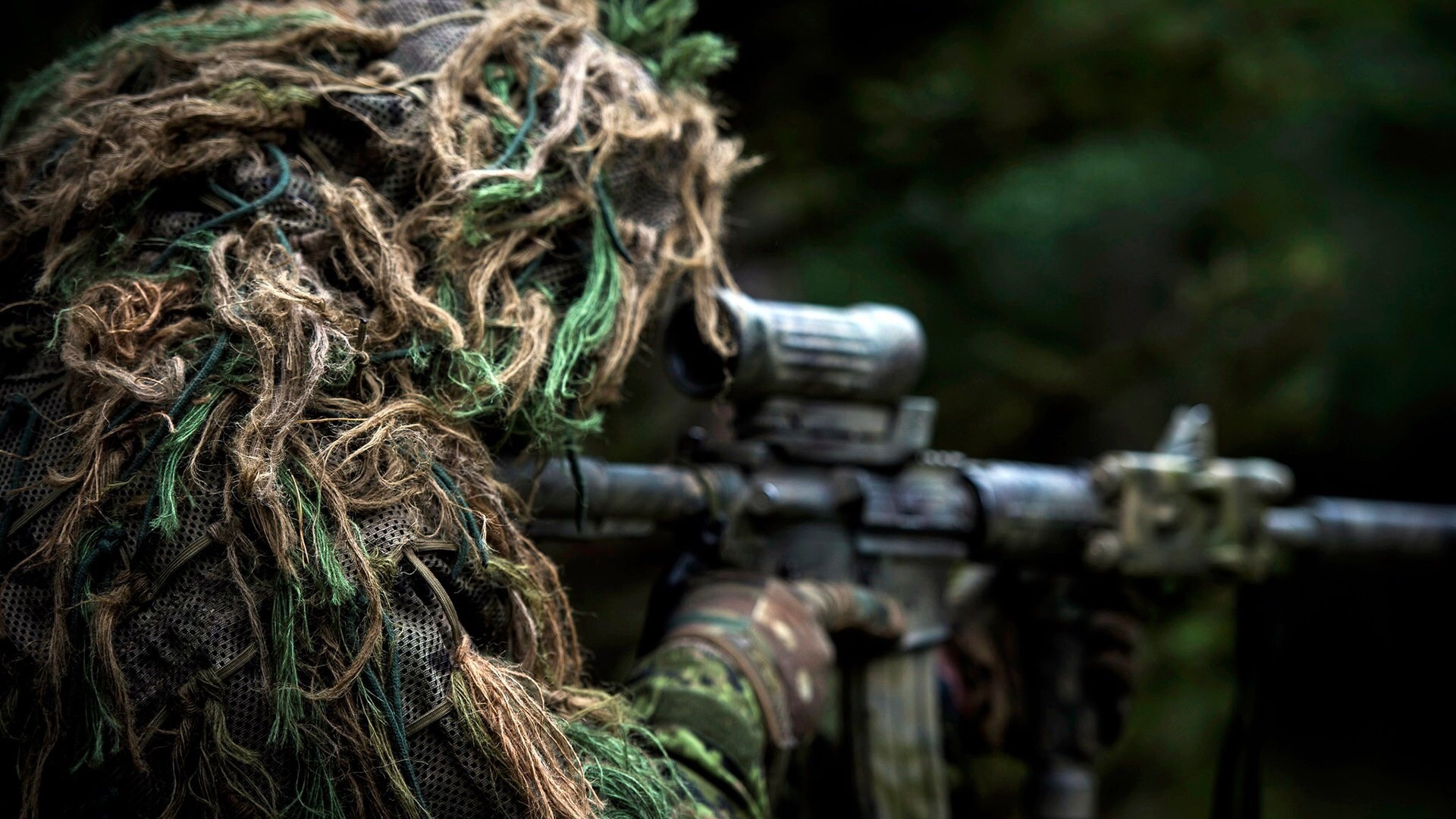 Sniper in ghillie suit aiming rifle HD Wallpaper
