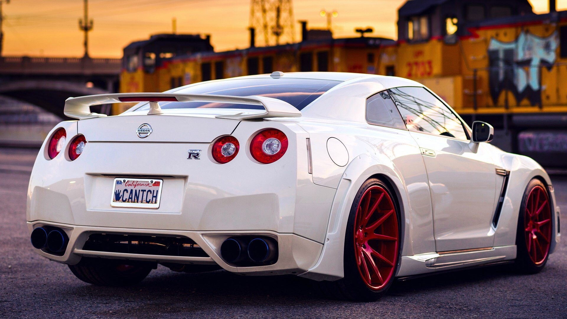 White Nissan GT-R with red rims HD Wallpaper