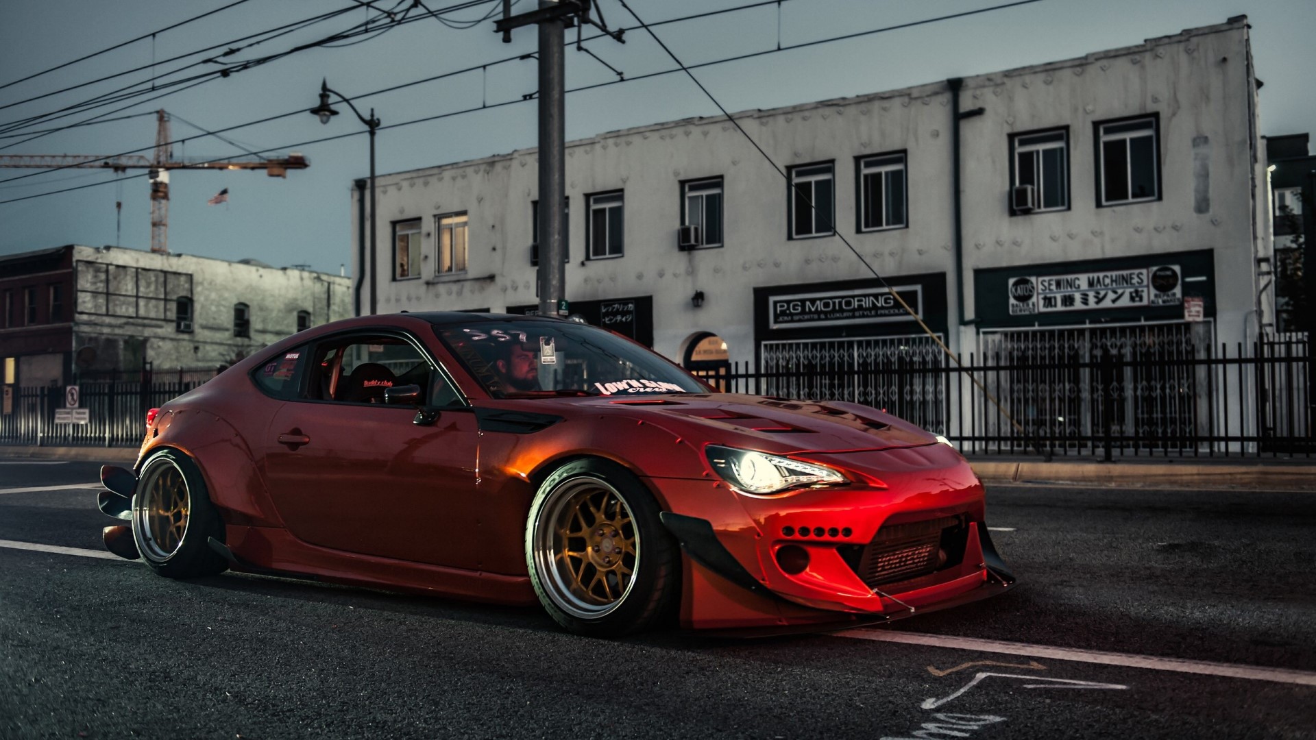 Red Scion FR-S modified sports car on street HD Wallpaper