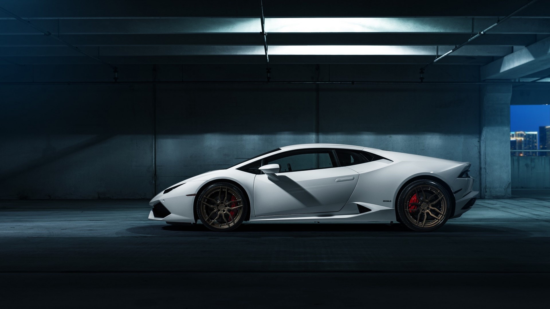 White Lamborghini Huracan in a parking garage HD Wallpaper