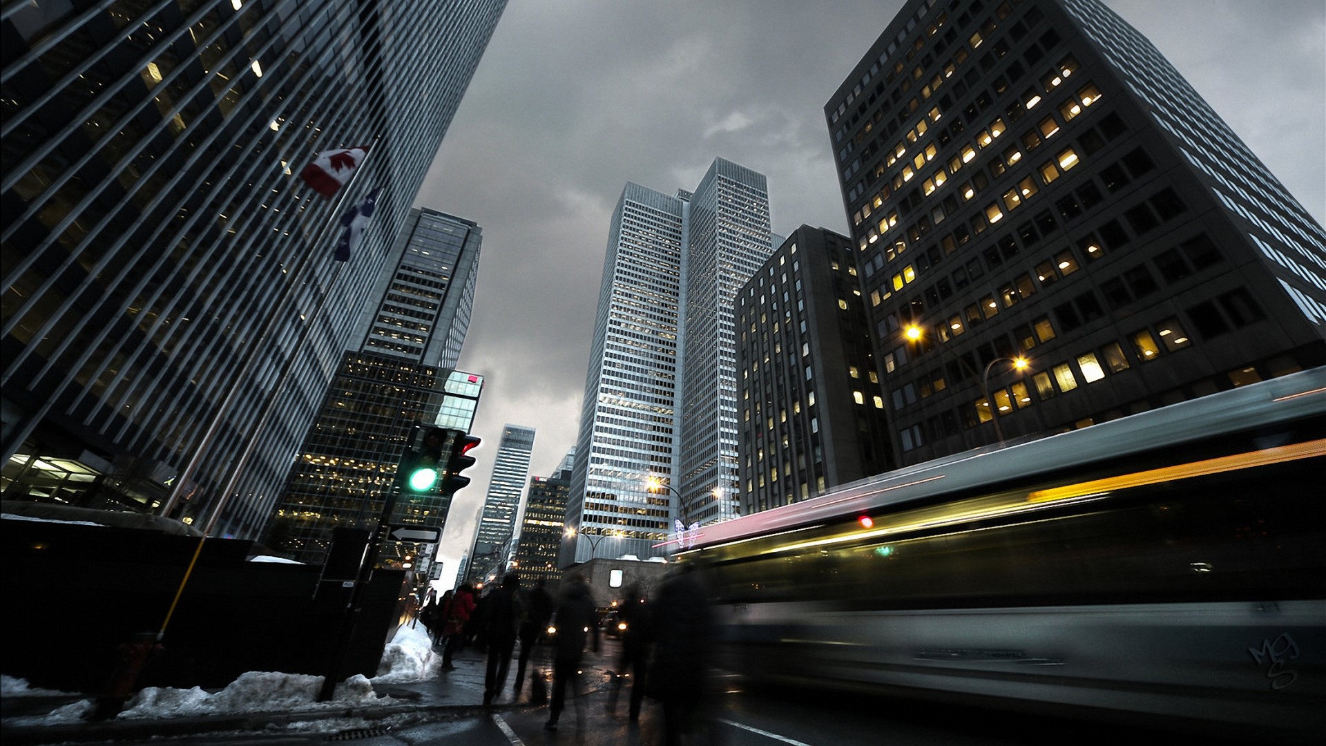 Cityscape with skyscrapers and blurred bus HD Wallpaper