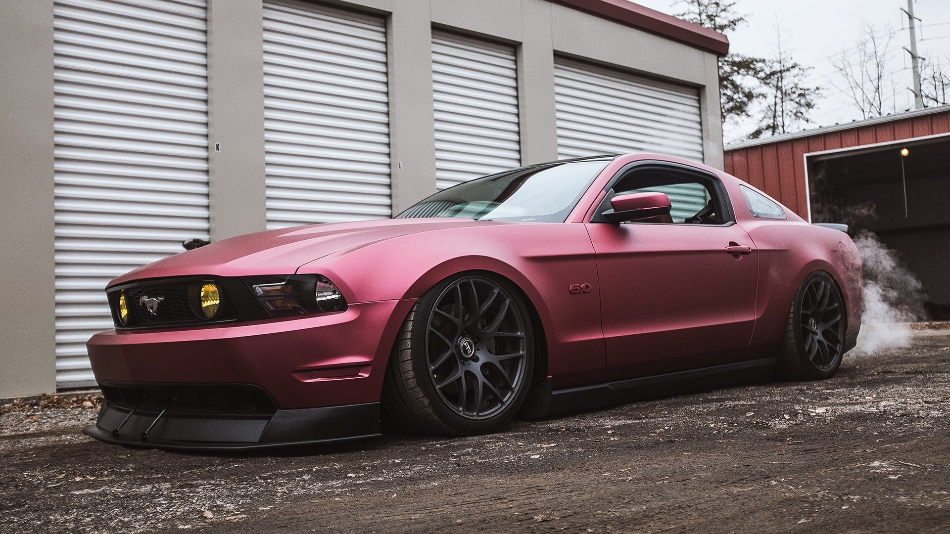 Ford Mustang with smoke coming from the exhaust HD Wallpaper
