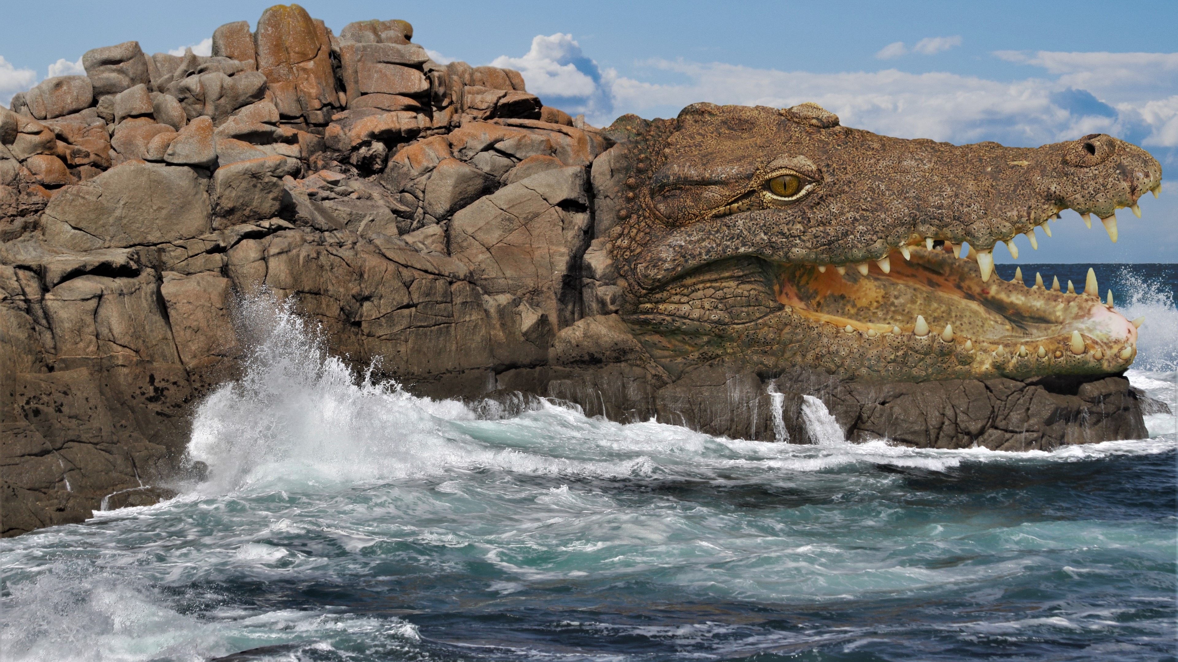 4K Crocodile Rock Formation in the Ocean HD Wallpaper
