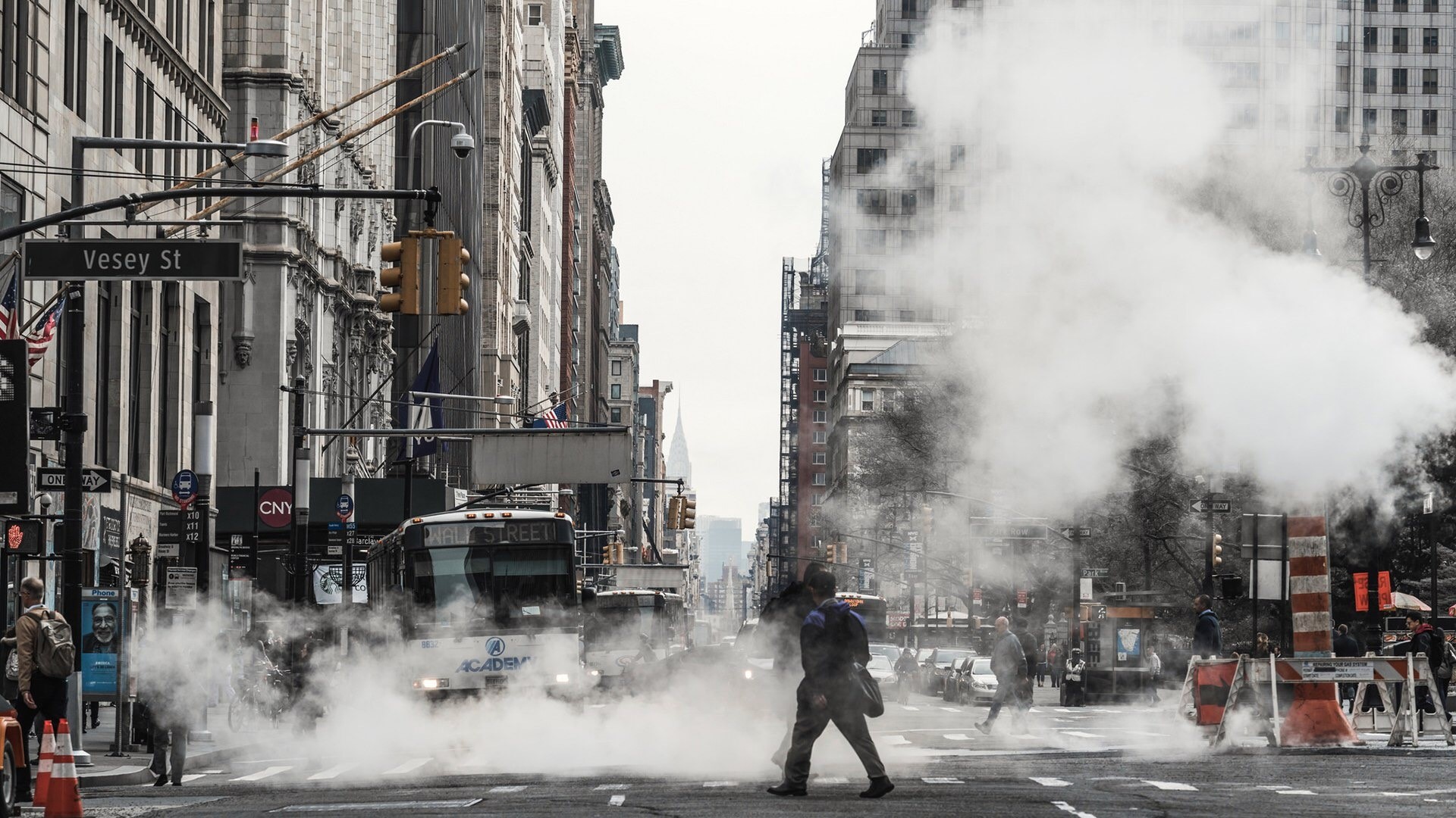 New York City street with steam and traffic HD Wallpaper