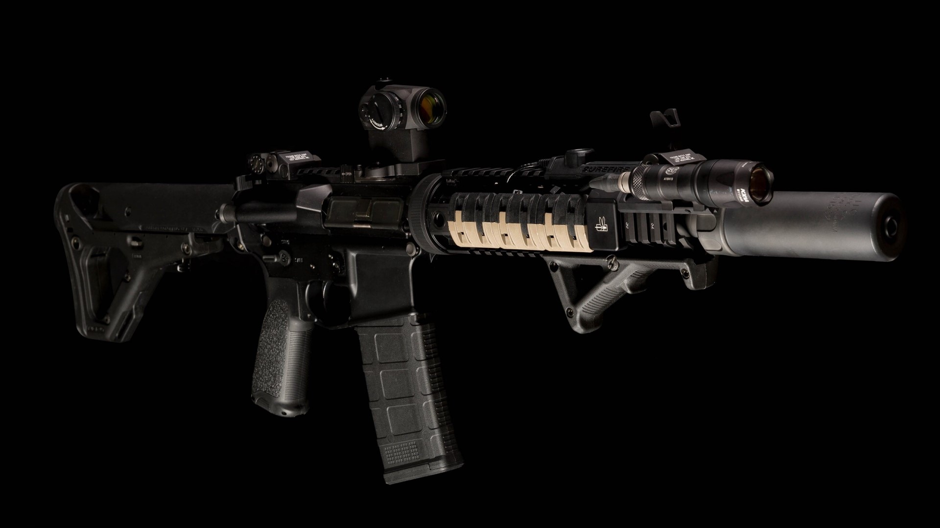 AR-15 rifle with suppressor and accessories HD Wallpaper