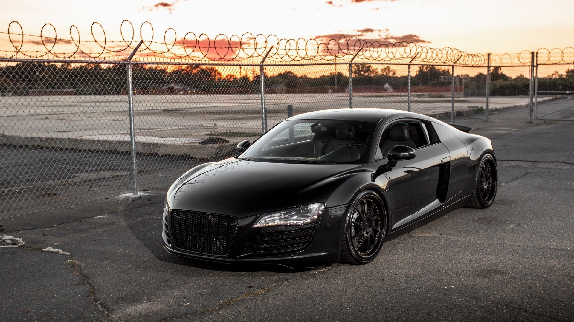 Black Audi R8 parked near a fence HD Wallpaper