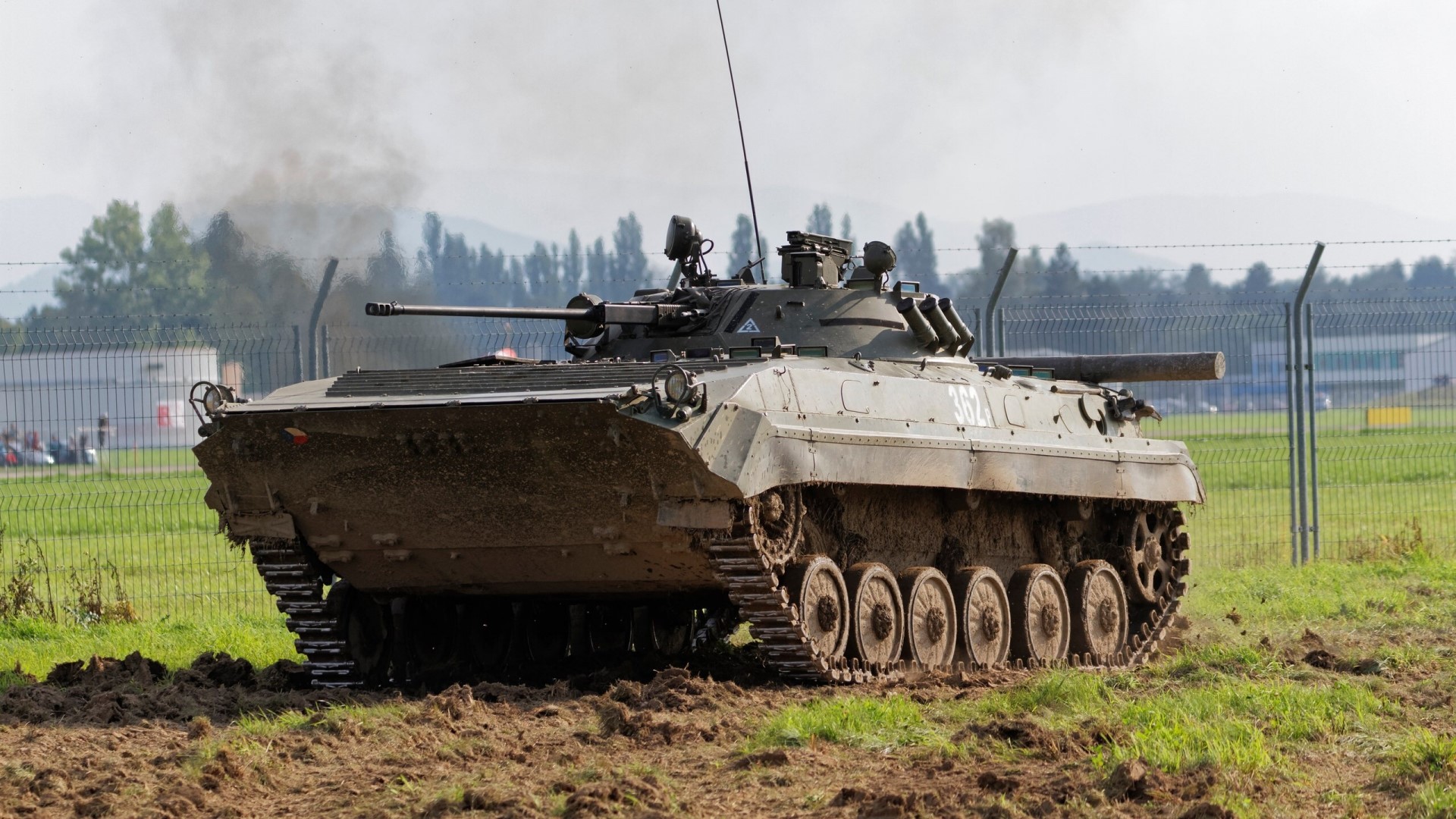 BMP-2 armored personnel carrier in a field HD Wallpaper