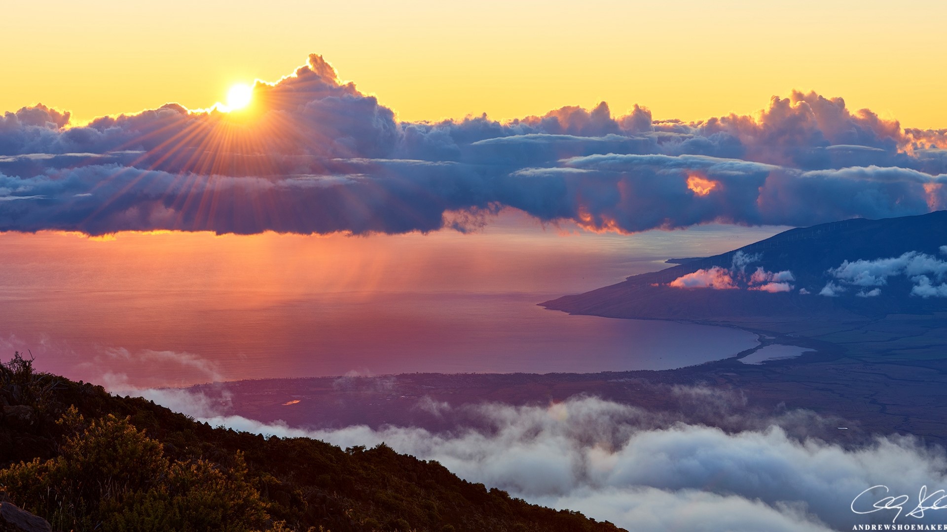 Sunrise over the ocean with clouds and mountains HD Wallpaper