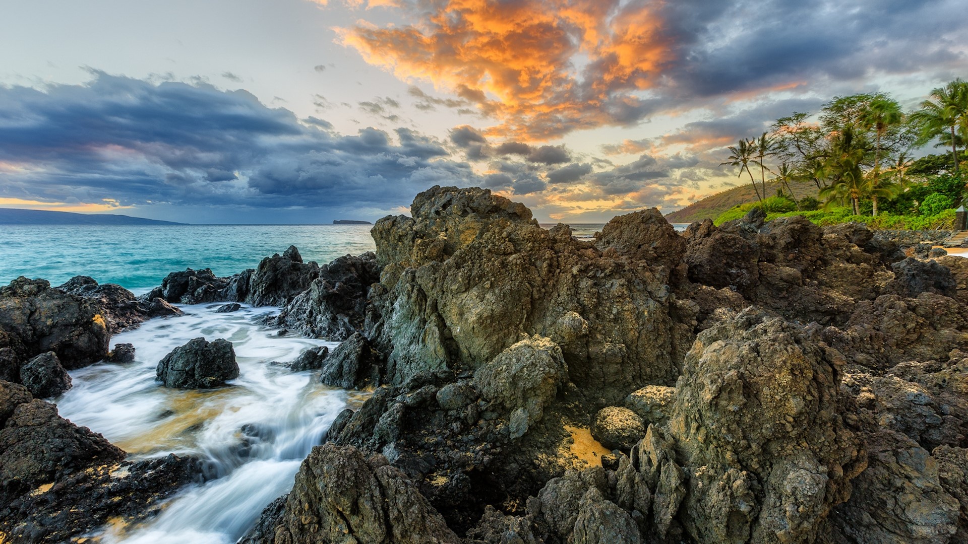 Rocky coastline with ocean waves and sunset sky HD Wallpaper