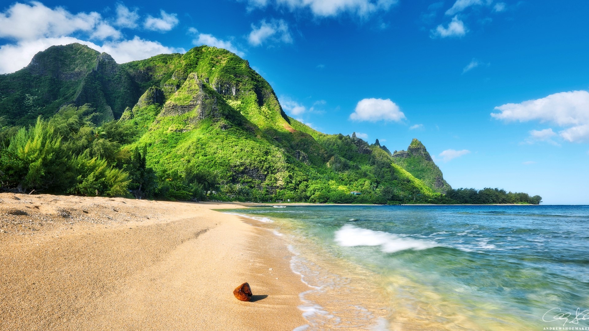Beach with green mountains and blue sky HD Wallpaper