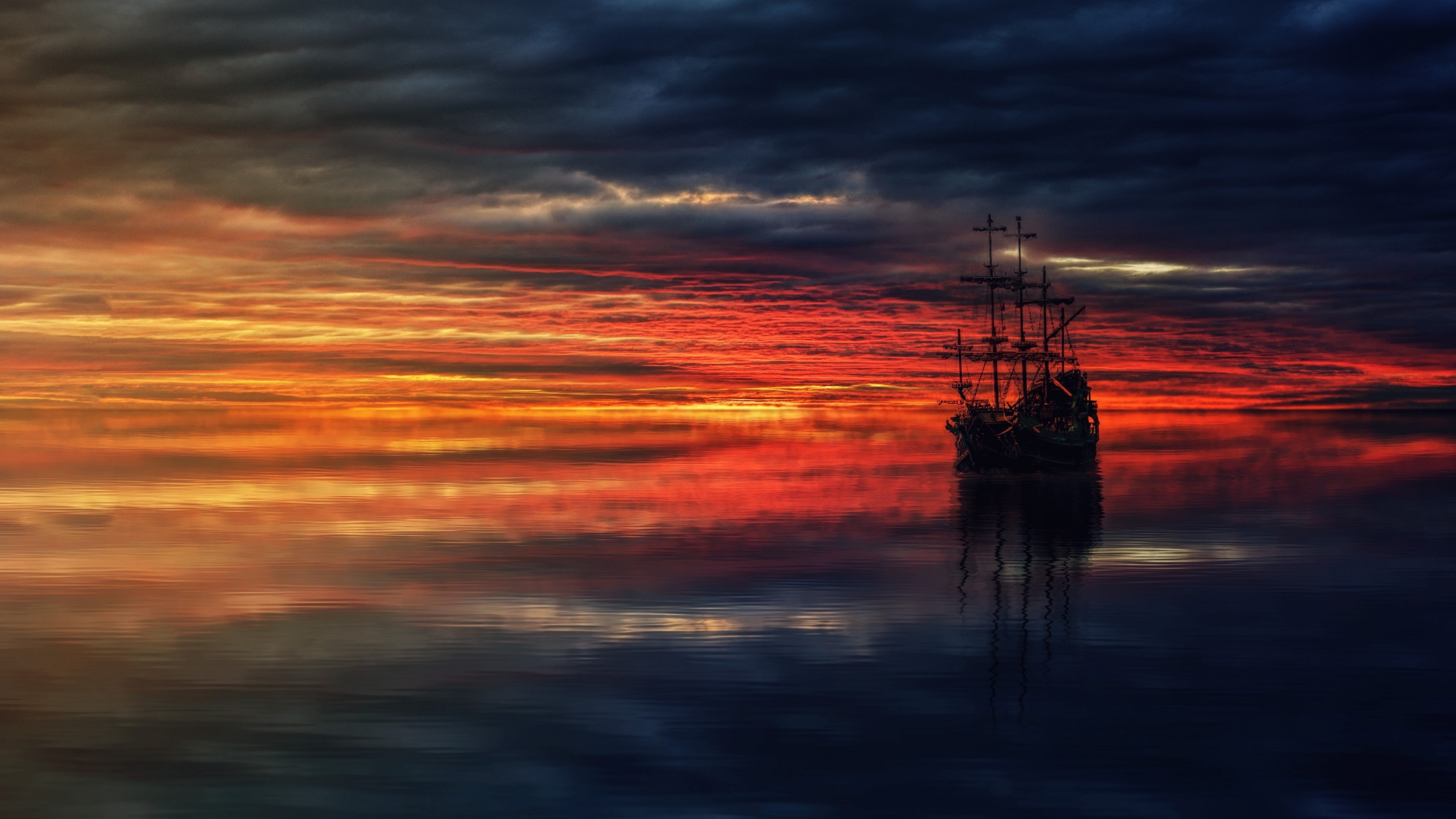 Sailing ship on the ocean at sunset HD Wallpaper