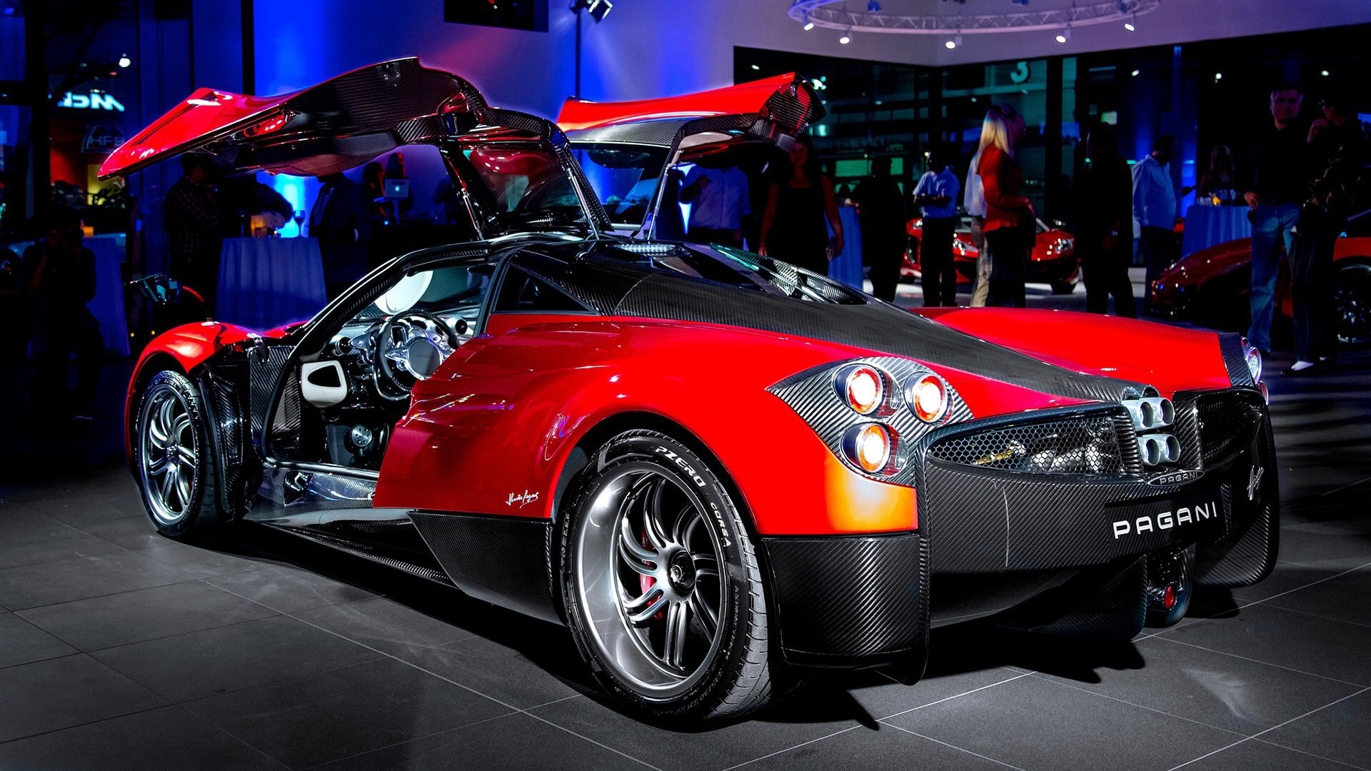Red Pagani Huayra with doors open HD Wallpaper
