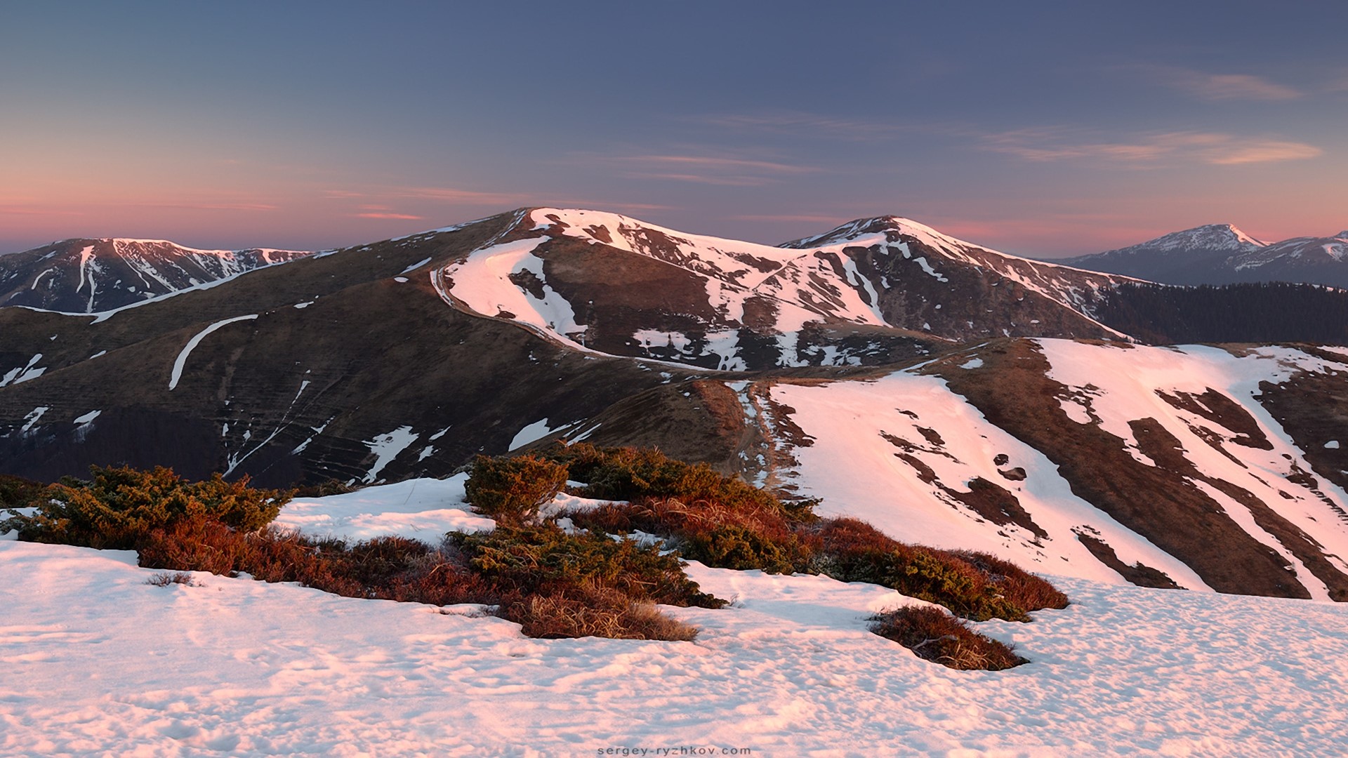 Mountains with snow at sunset HD Wallpaper