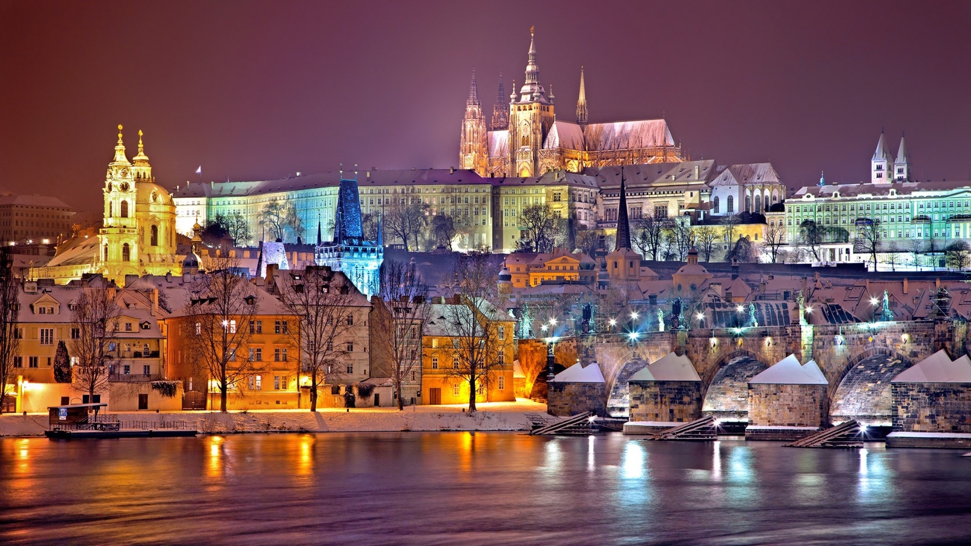 Prague Castle and Charles Bridge at night in winter HD Wallpaper