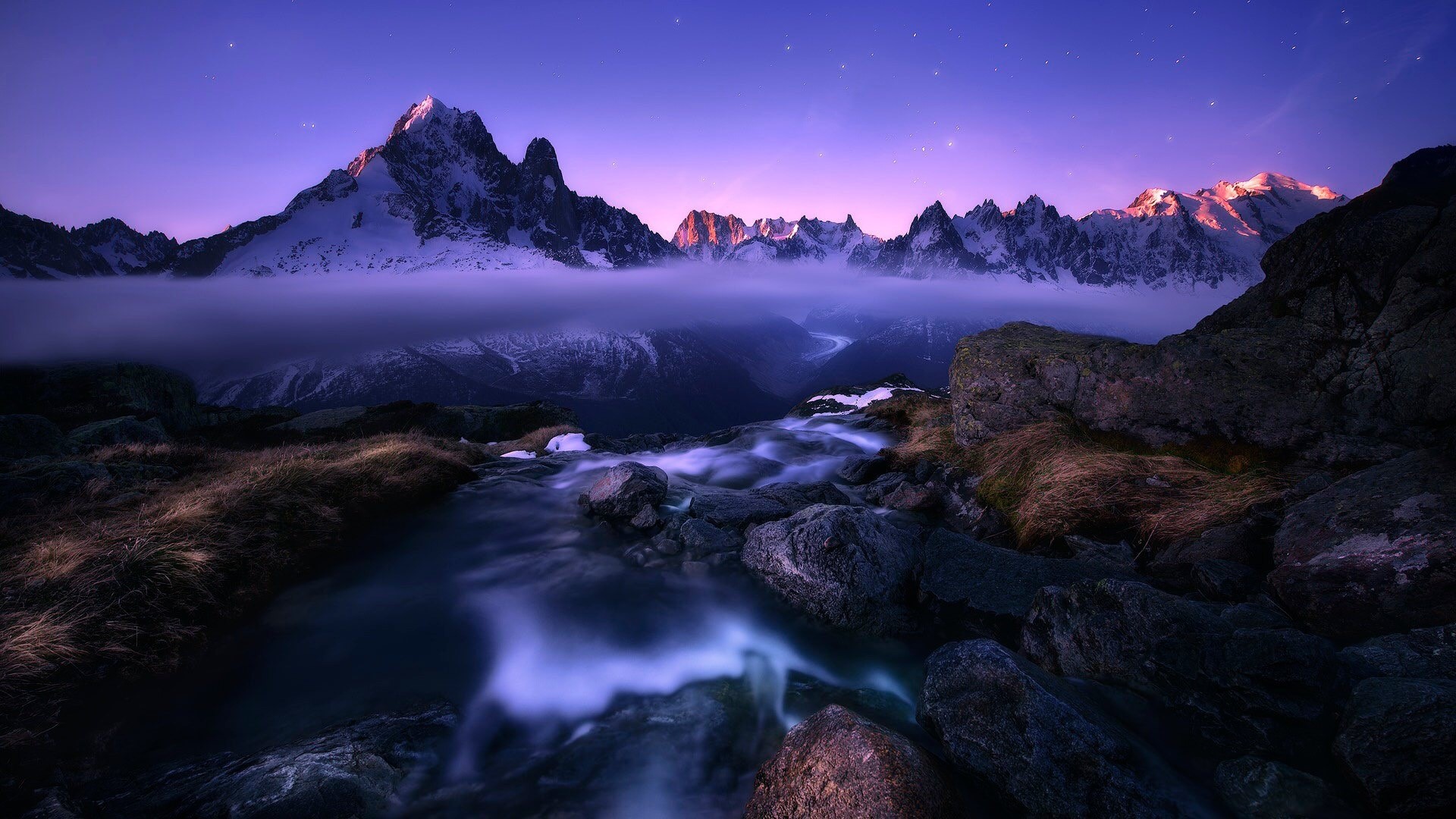 Alps mountains at twilight with fog and stream HD Wallpaper