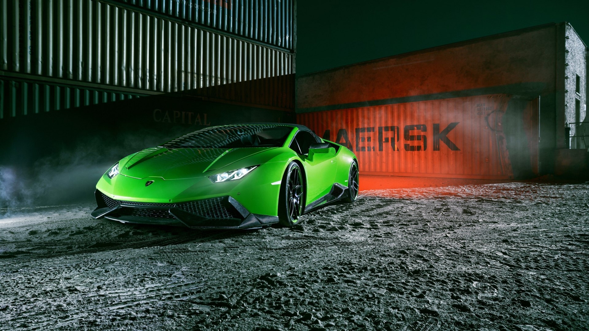 Green Lamborghini Huracan parked near shipping containers HD Wallpaper