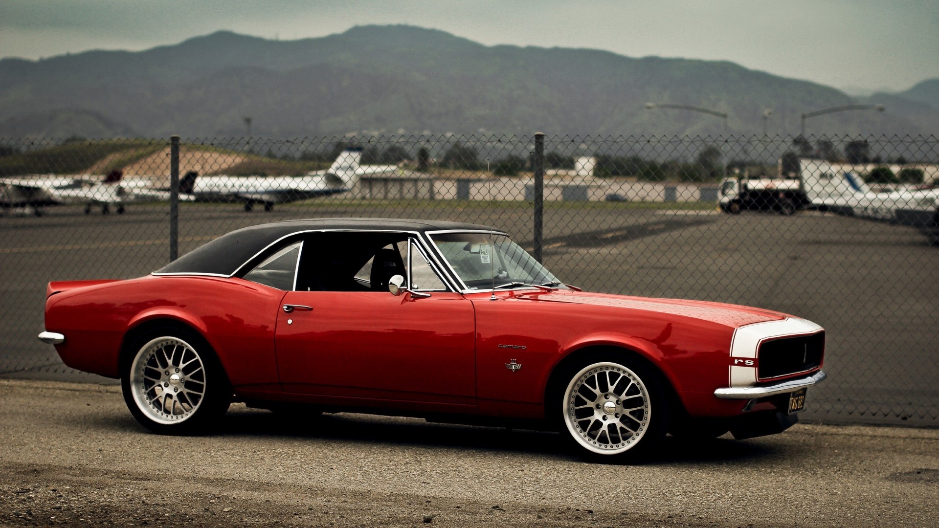 1968 Chevrolet Camaro RS at an airfield HD Wallpaper