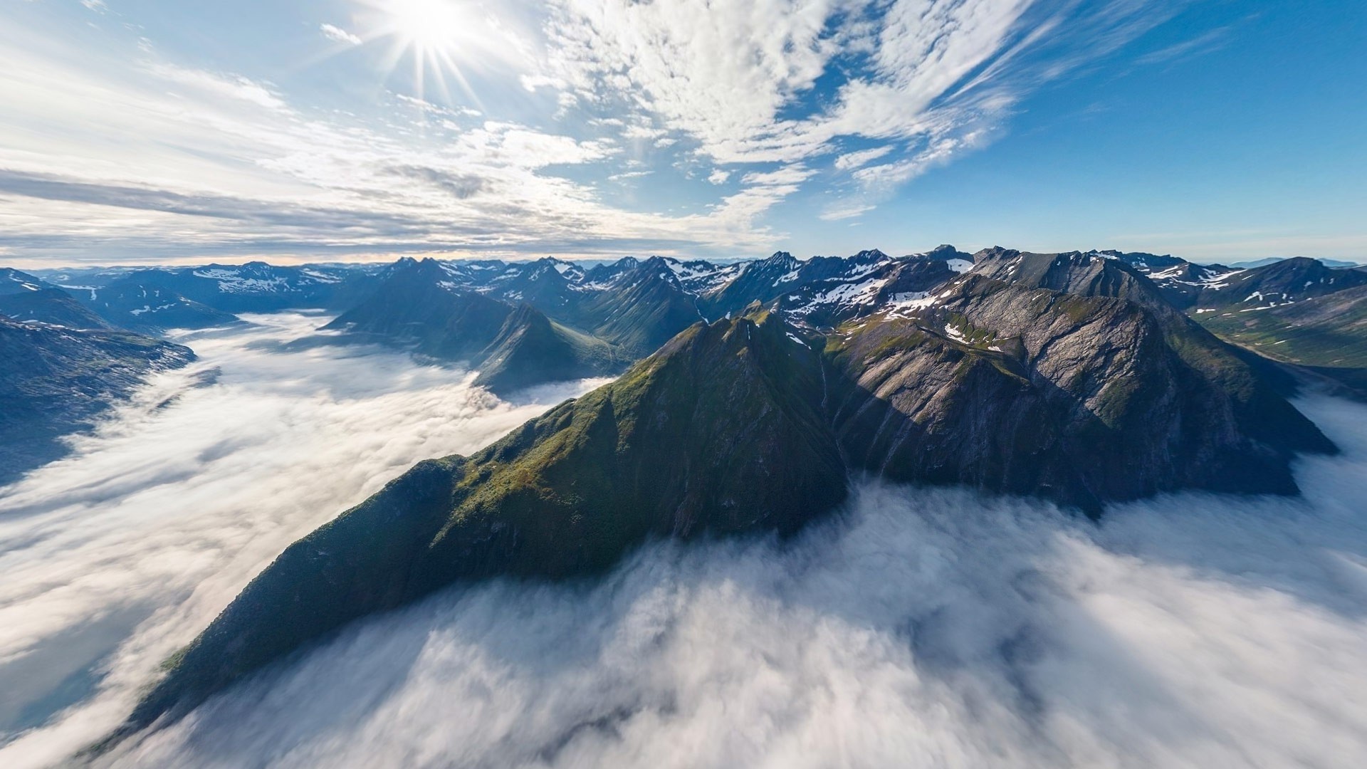 Mountains above clouds with sun and sky HD Wallpaper