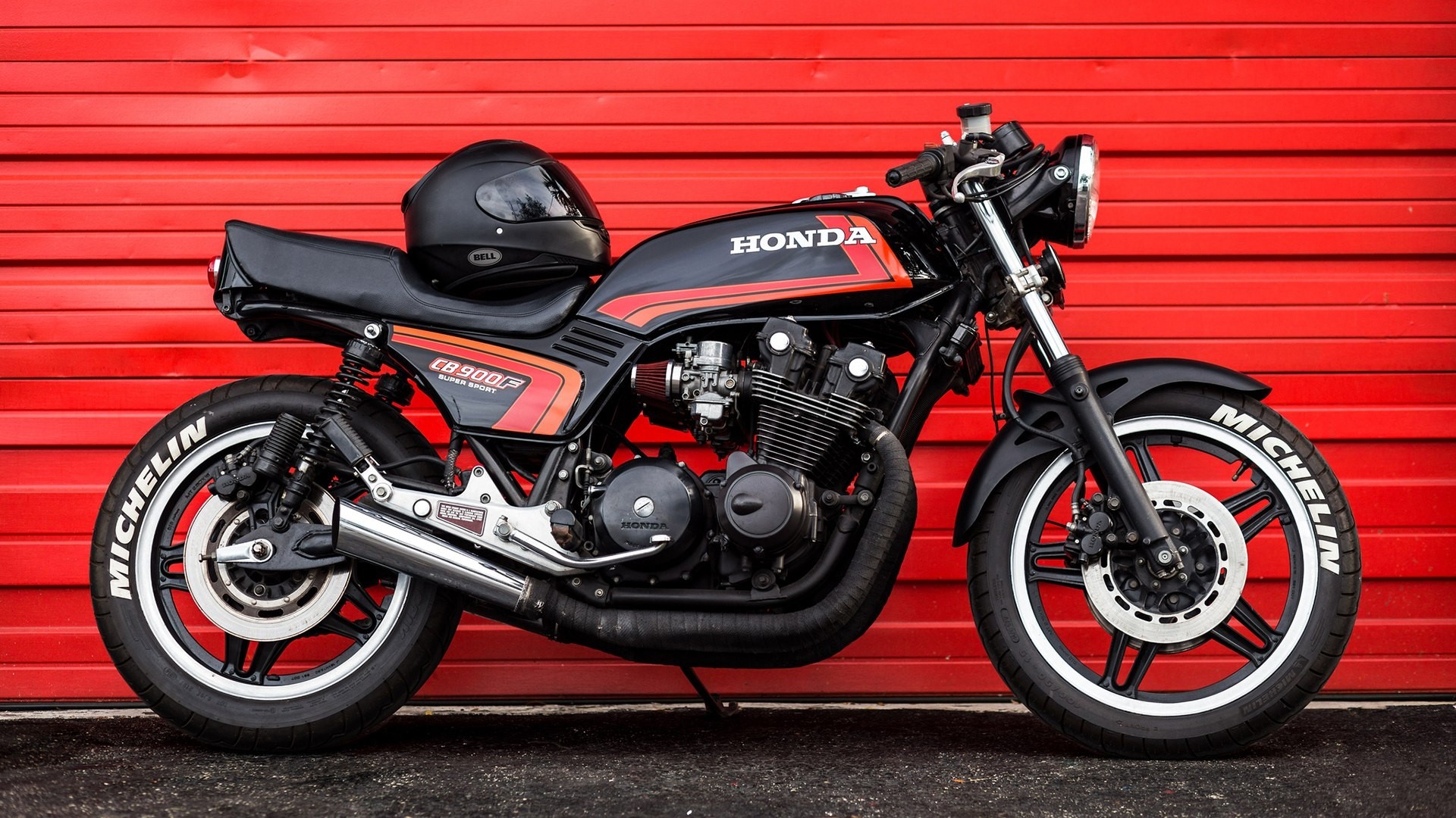 1982 Honda CB900F motorcycle with helmet HD Wallpaper