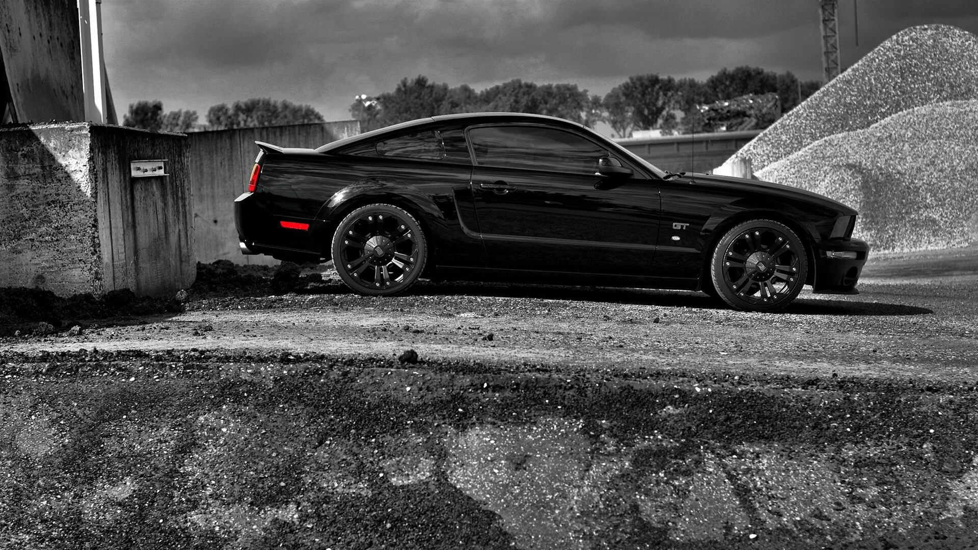 Black Ford Mustang GT parked outdoors HD Wallpaper
