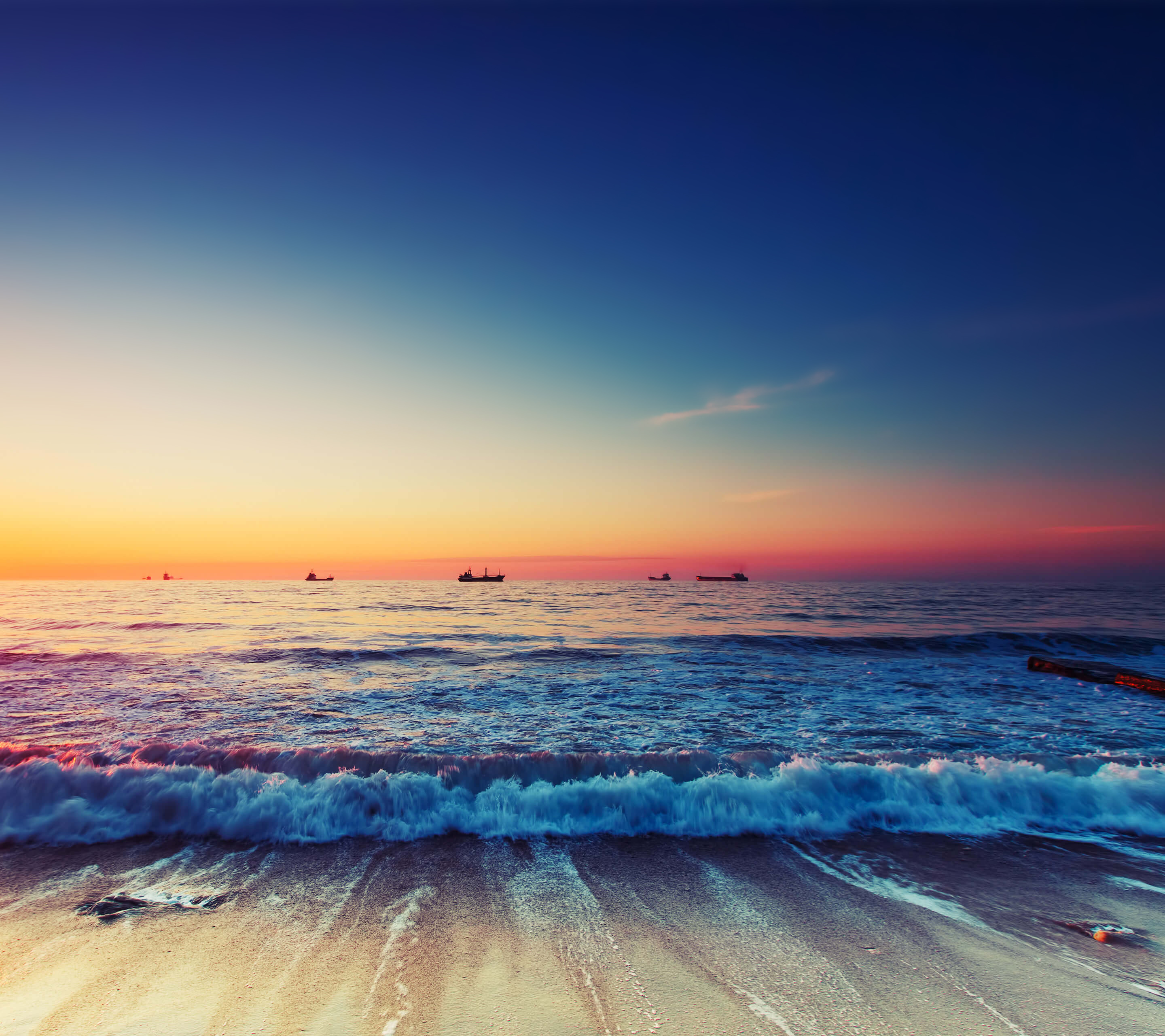 Ships on the ocean at sunset HD Wallpaper