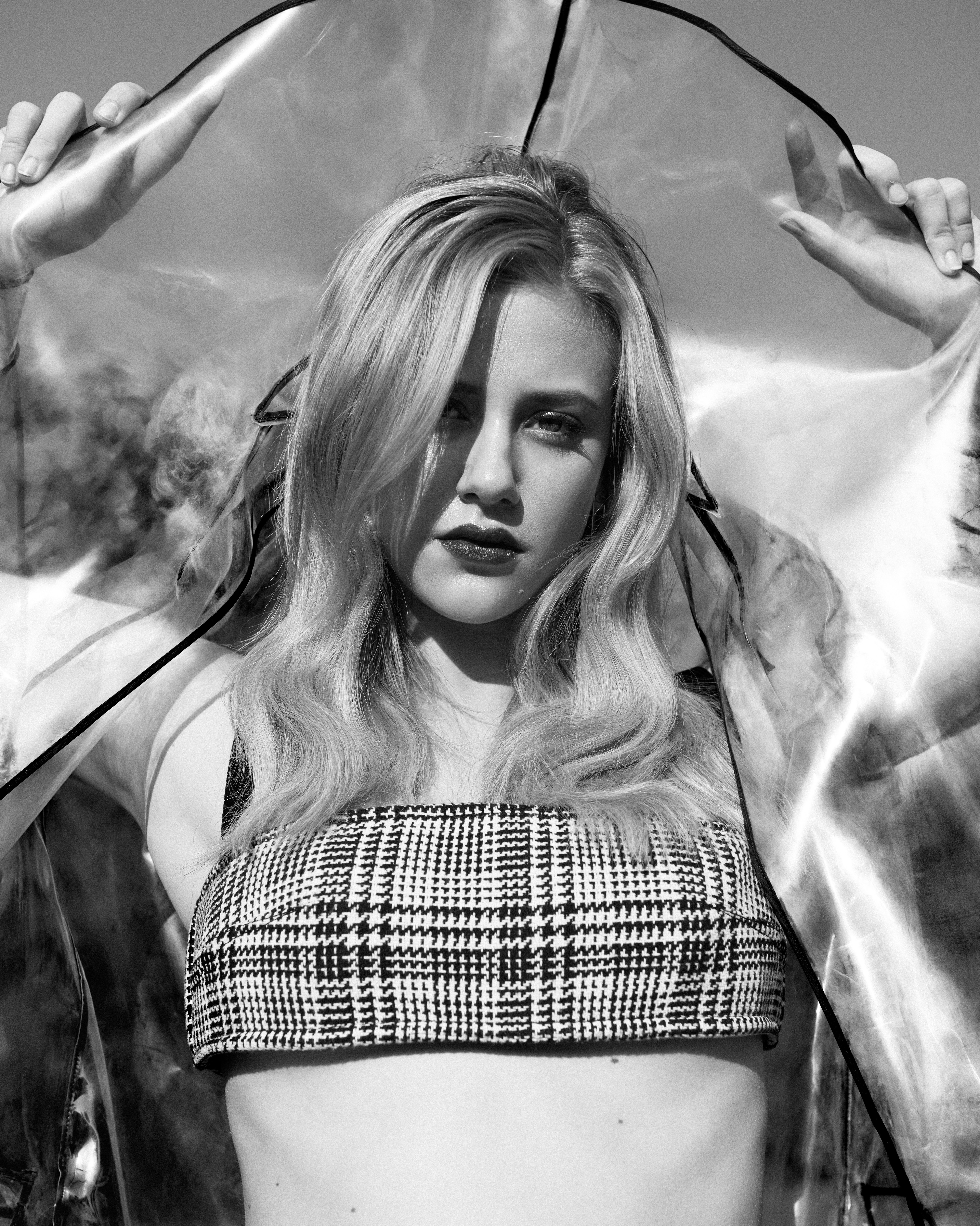 Lili Reinhart in a plaid top and clear jacket HD Wallpaper