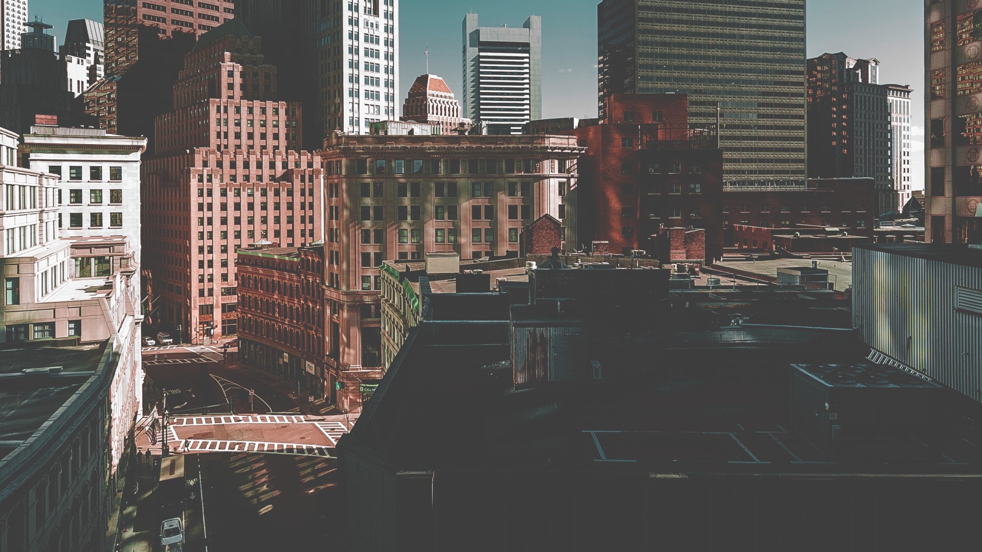 Cityscape with tall buildings and streets HD Wallpaper